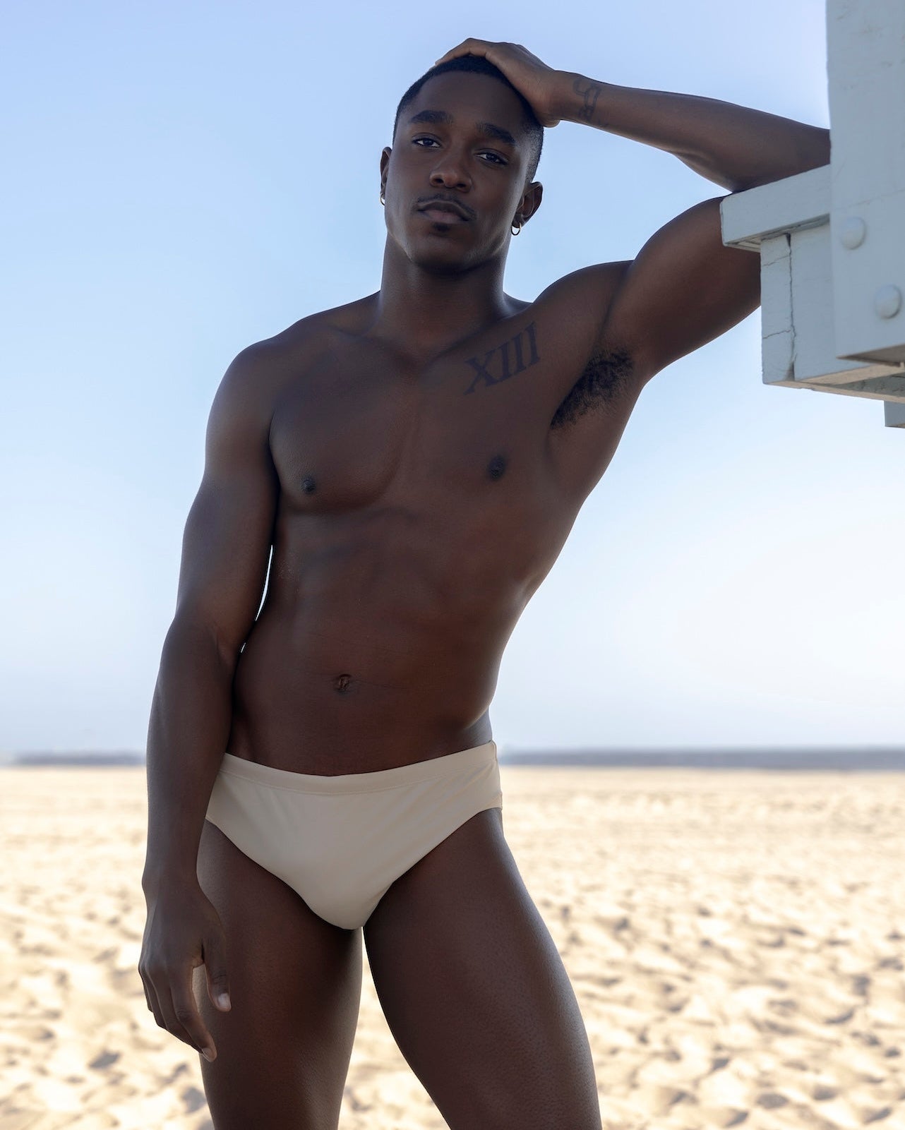 Sean & Val Classic Brief Ecru — men's swim brief, model 3/4 front view