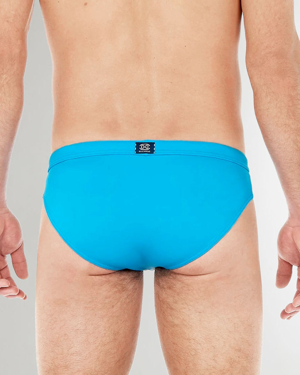 HOM Sea Life Swim Mini Brief Turquoise - men's mini swim brief showing hip silhouette, three-quarter view