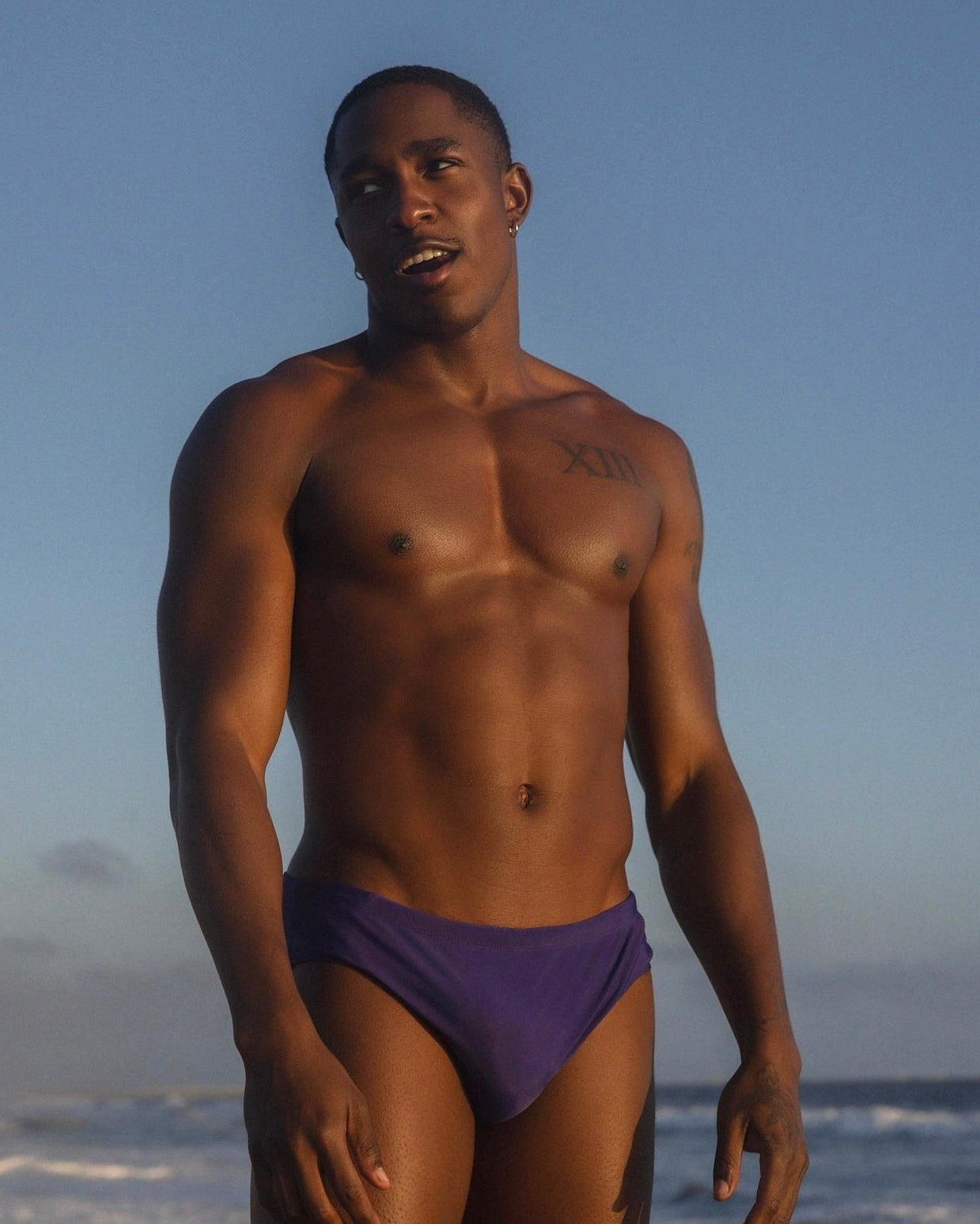 Sean & Val Classic Brief Indigo — men's swim brief, model front view