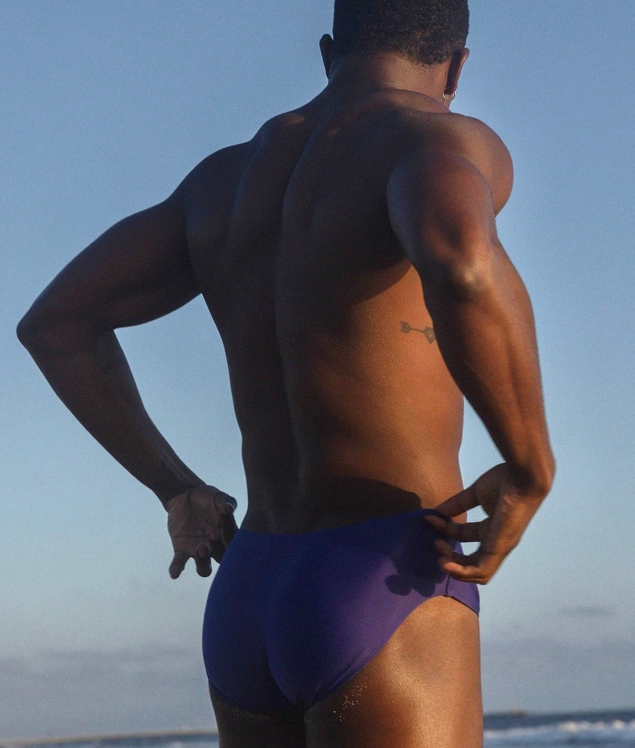 Sean & Val Classic Brief Indigo — men's swim brief, model 3/4 front view