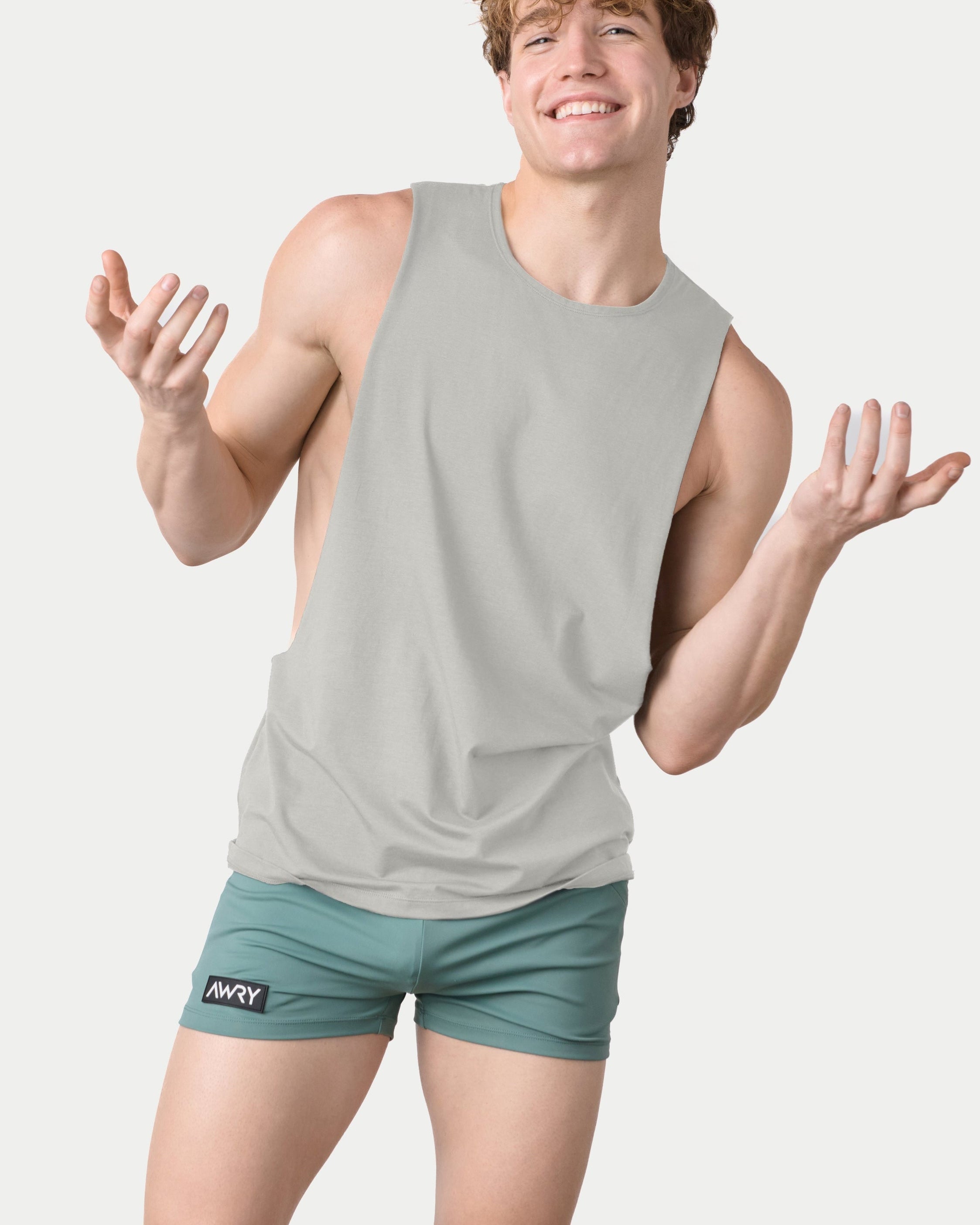 Awry Impact Tank Stone — side view showing deep armhole cutout and relaxed draped silhouette