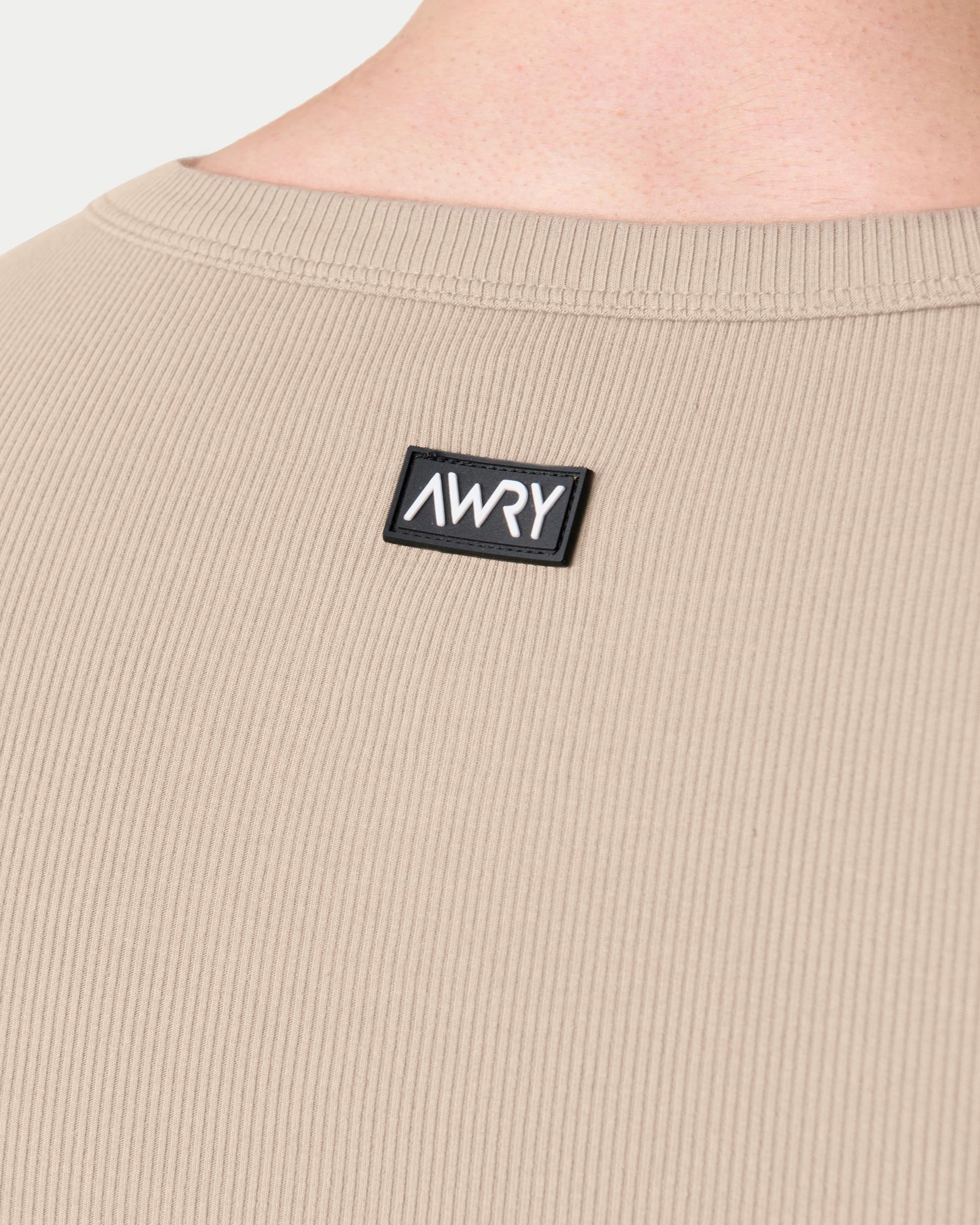Awry Ribbed Tank Sand — men's sleeveless tank top lifestyle styling