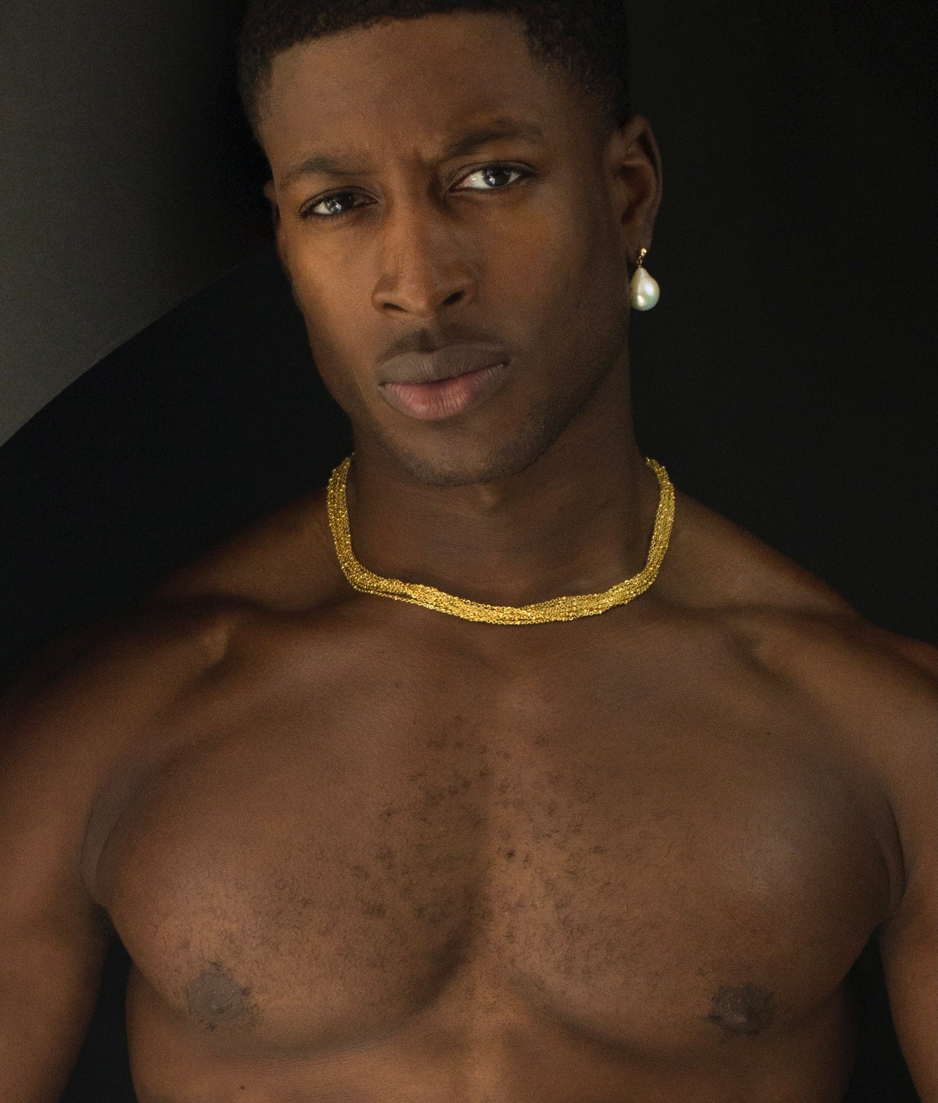 Etalon Infinity Chain - men's layered necklace worn on model, styled with open collar