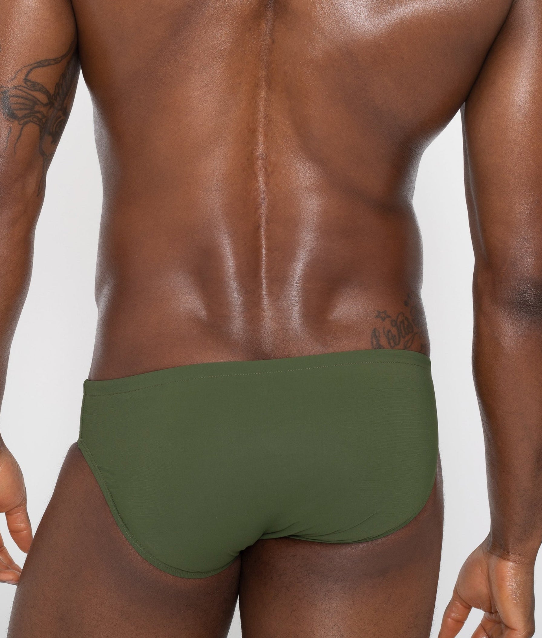 Sean & Val Classic Brief Olive — men's swim brief lifestyle shot at beach or pool