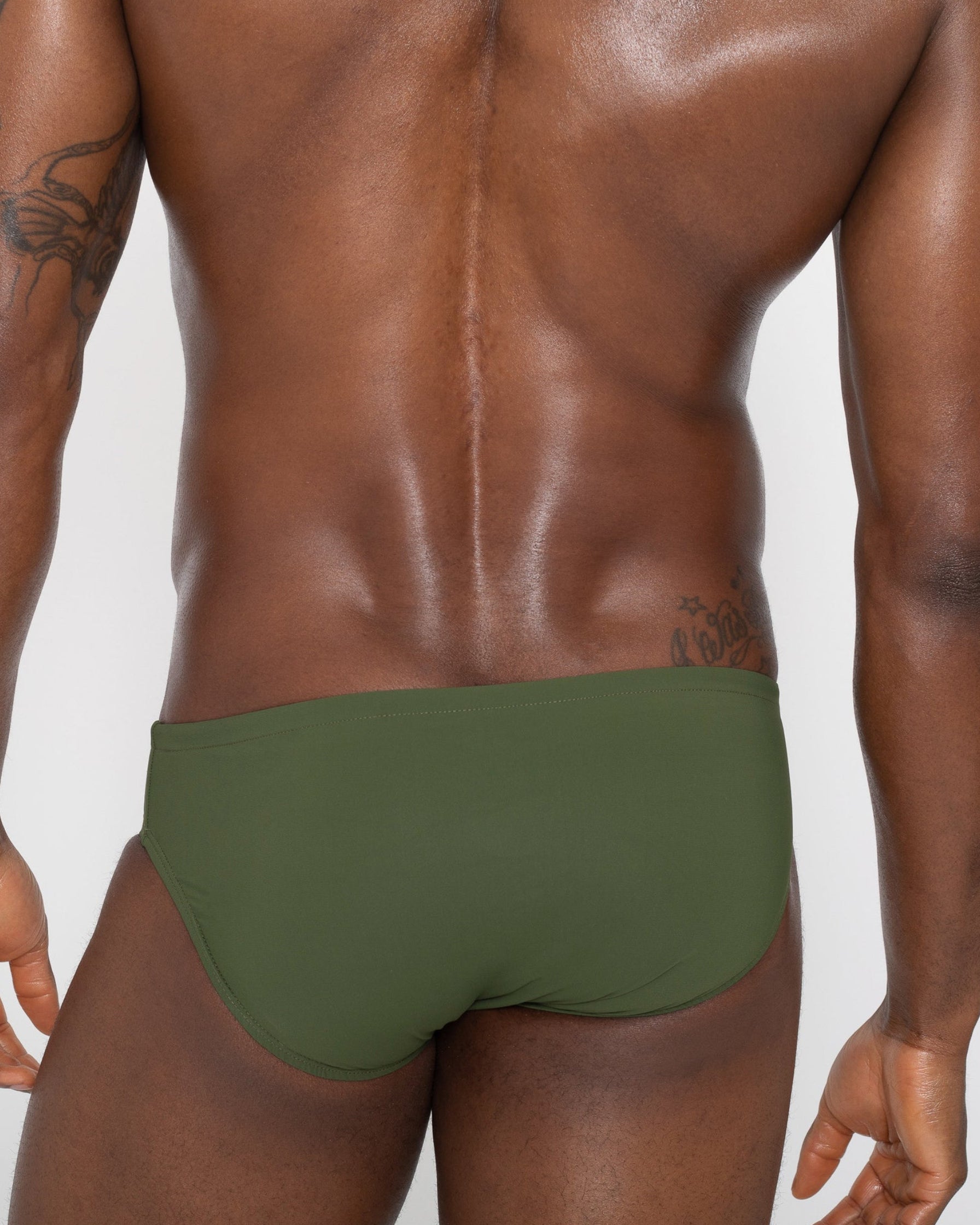 Sean & Val Classic Brief Olive — men's swim brief lifestyle shot at beach or pool