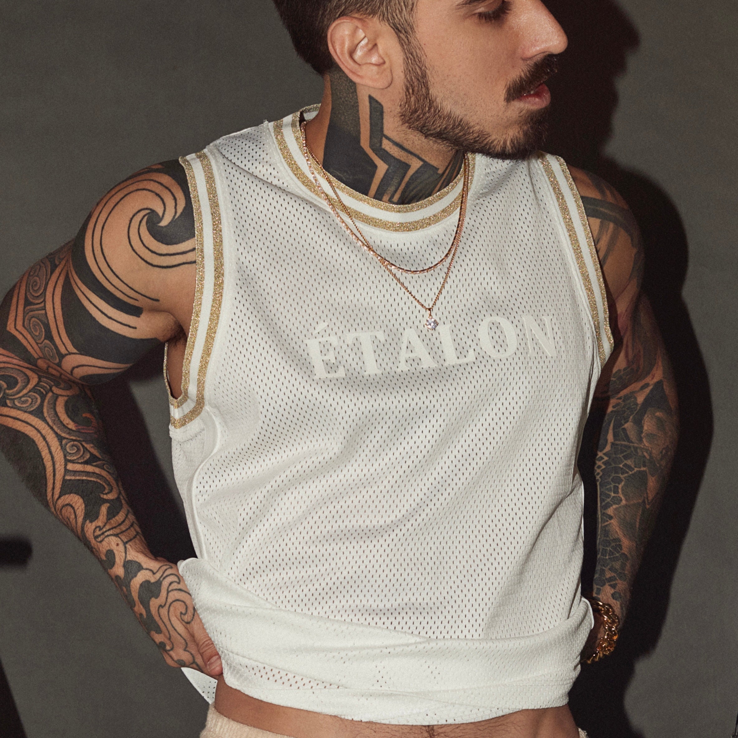 Etalon Signature Baller Jersey Black - men's basketball jersey with silver trim and silicone logo, front view