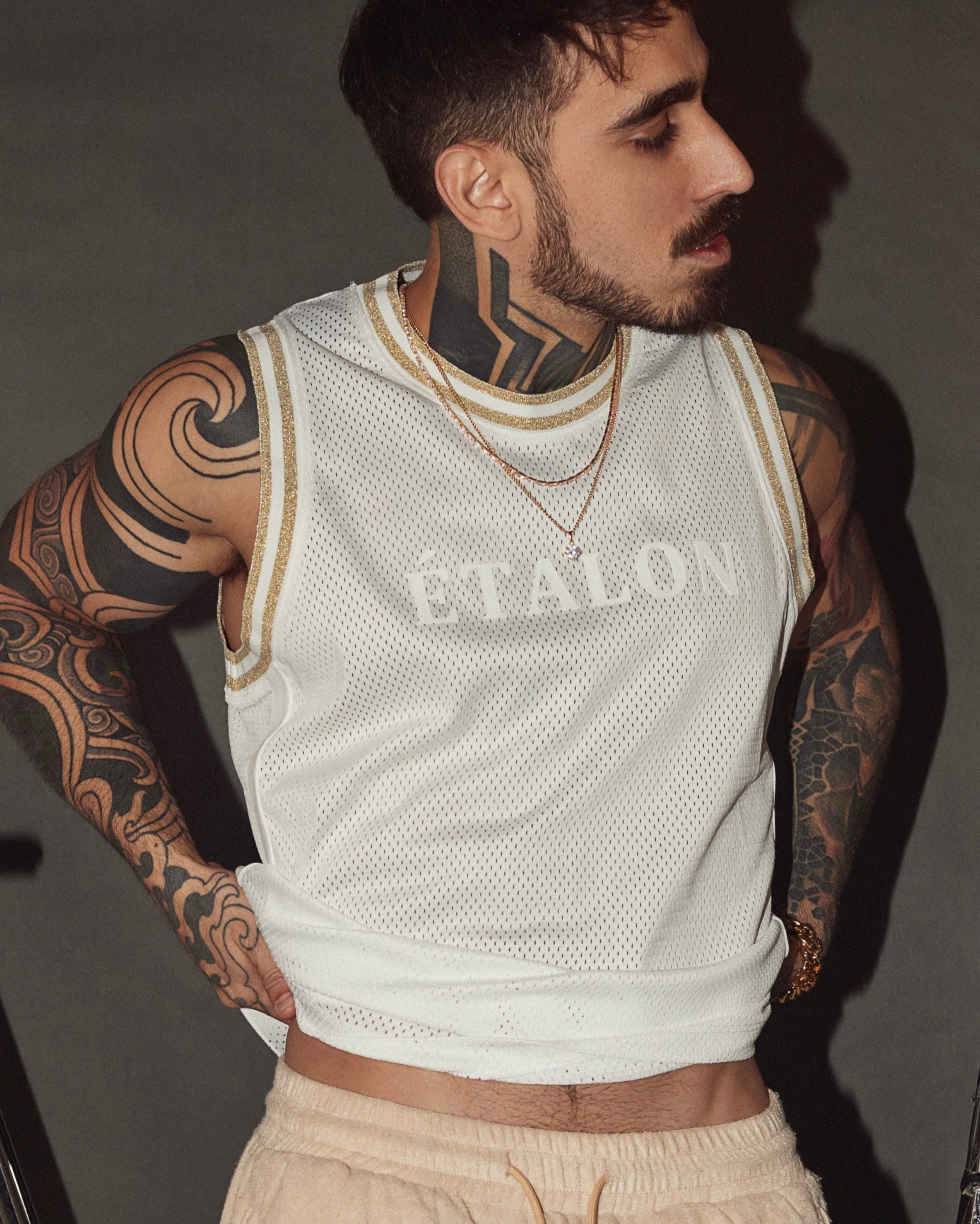 Etalon Signature Baller Jersey Black - men's basketball jersey with silver trim and silicone logo, front view