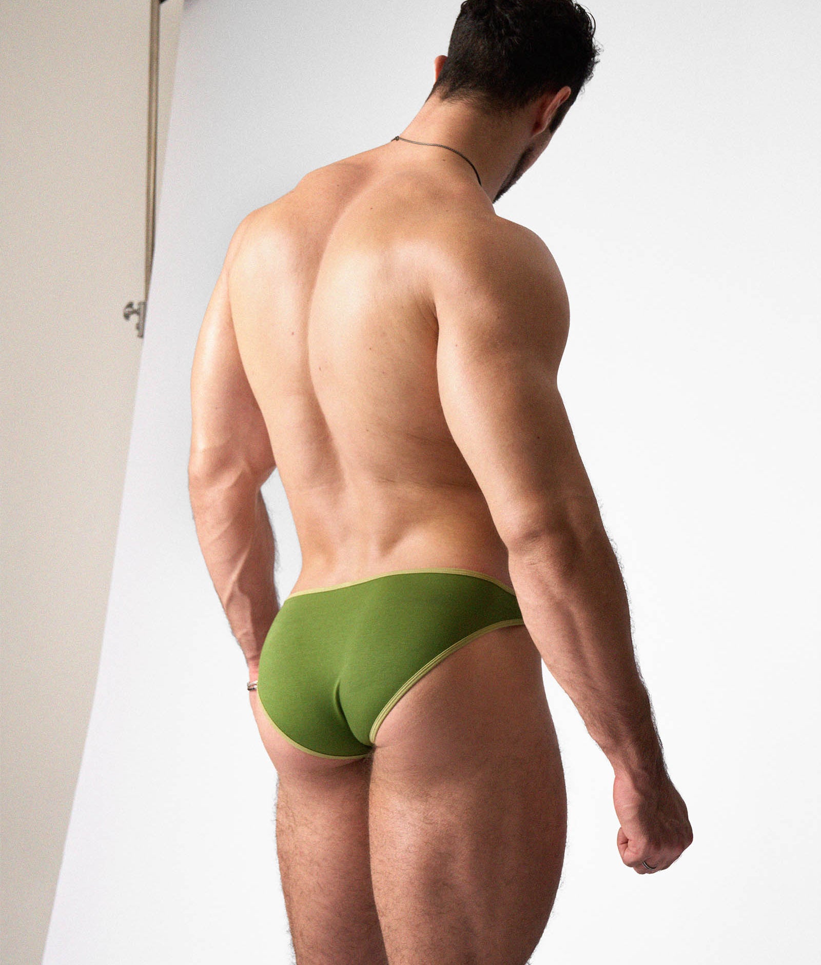 Teamm8 Flaunt Bikini Brief Eucalyptus - GLIDE fabric brief in eucalyptus green, close-up detail