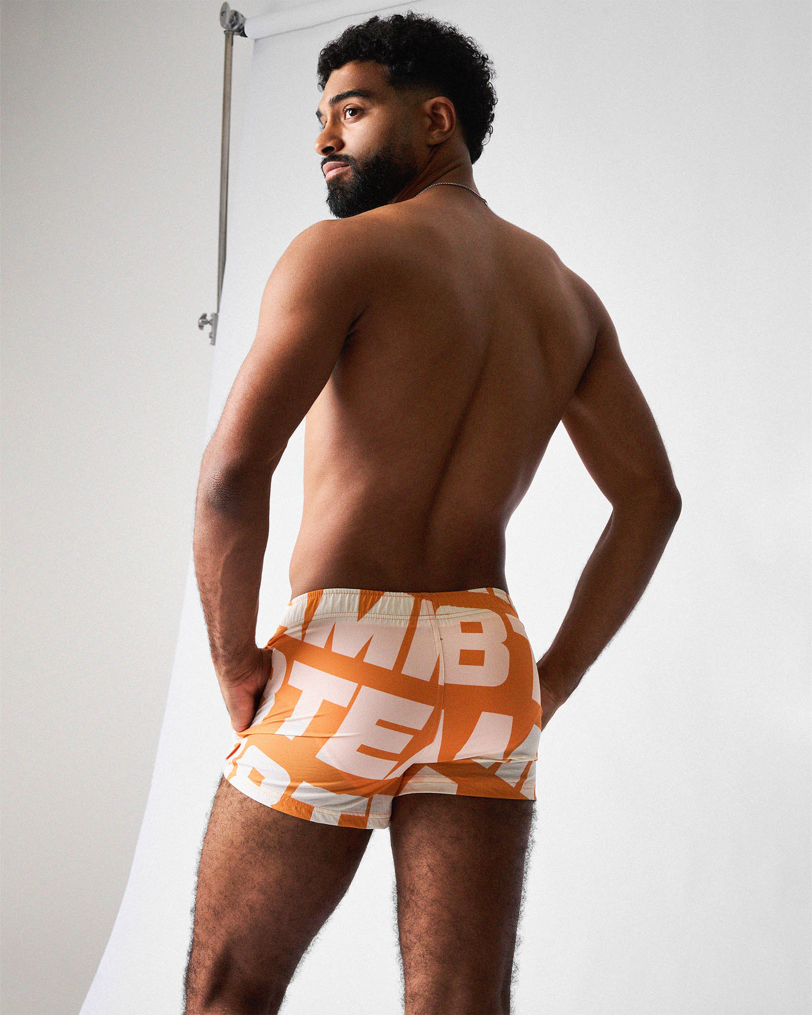 Teamm8 Headliner Swim Short Orange - 2-inch inseam men's swim trunks, rear view