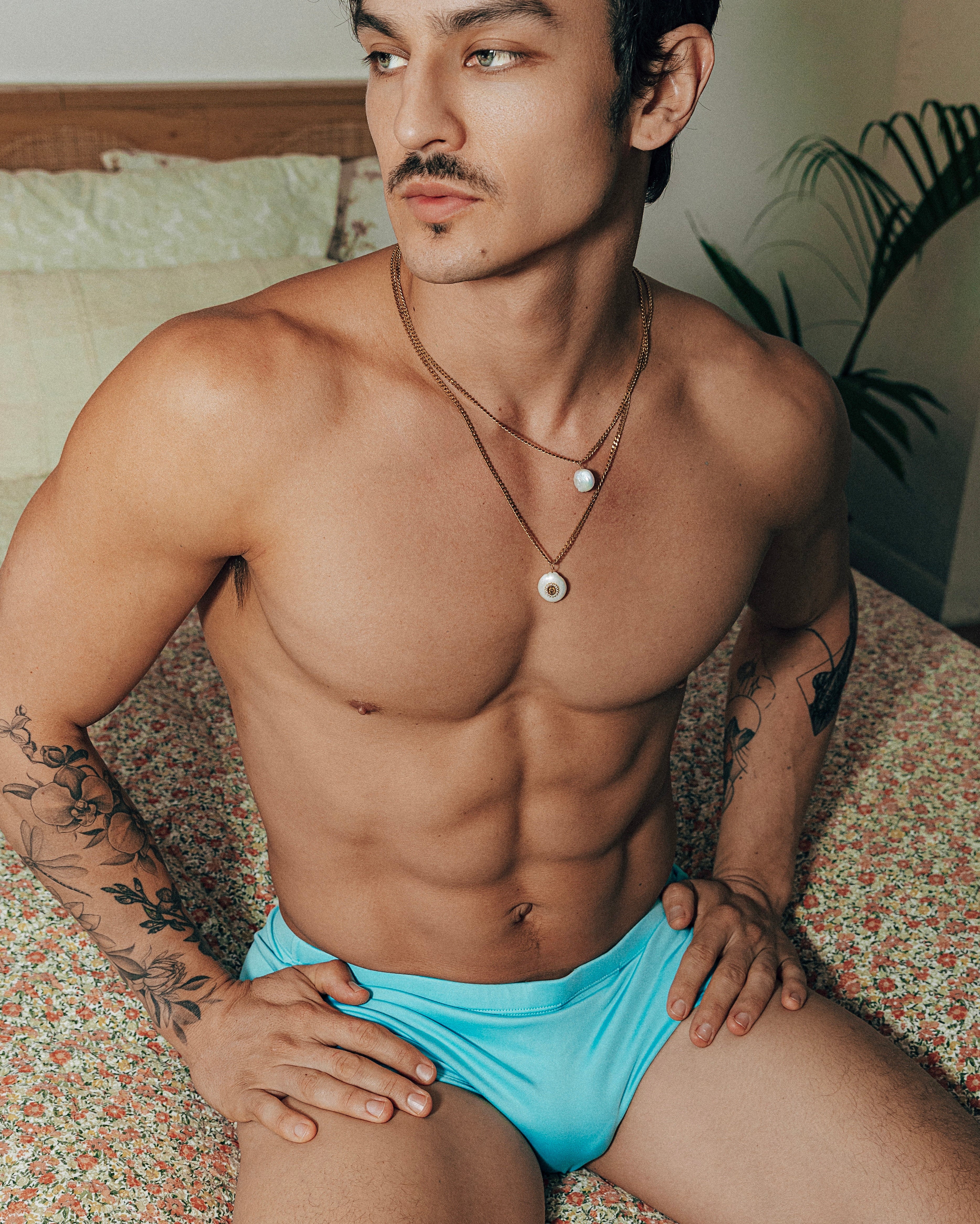 Étalon Aqua Swim Sunga - men's swim brief seated at pool, front angle