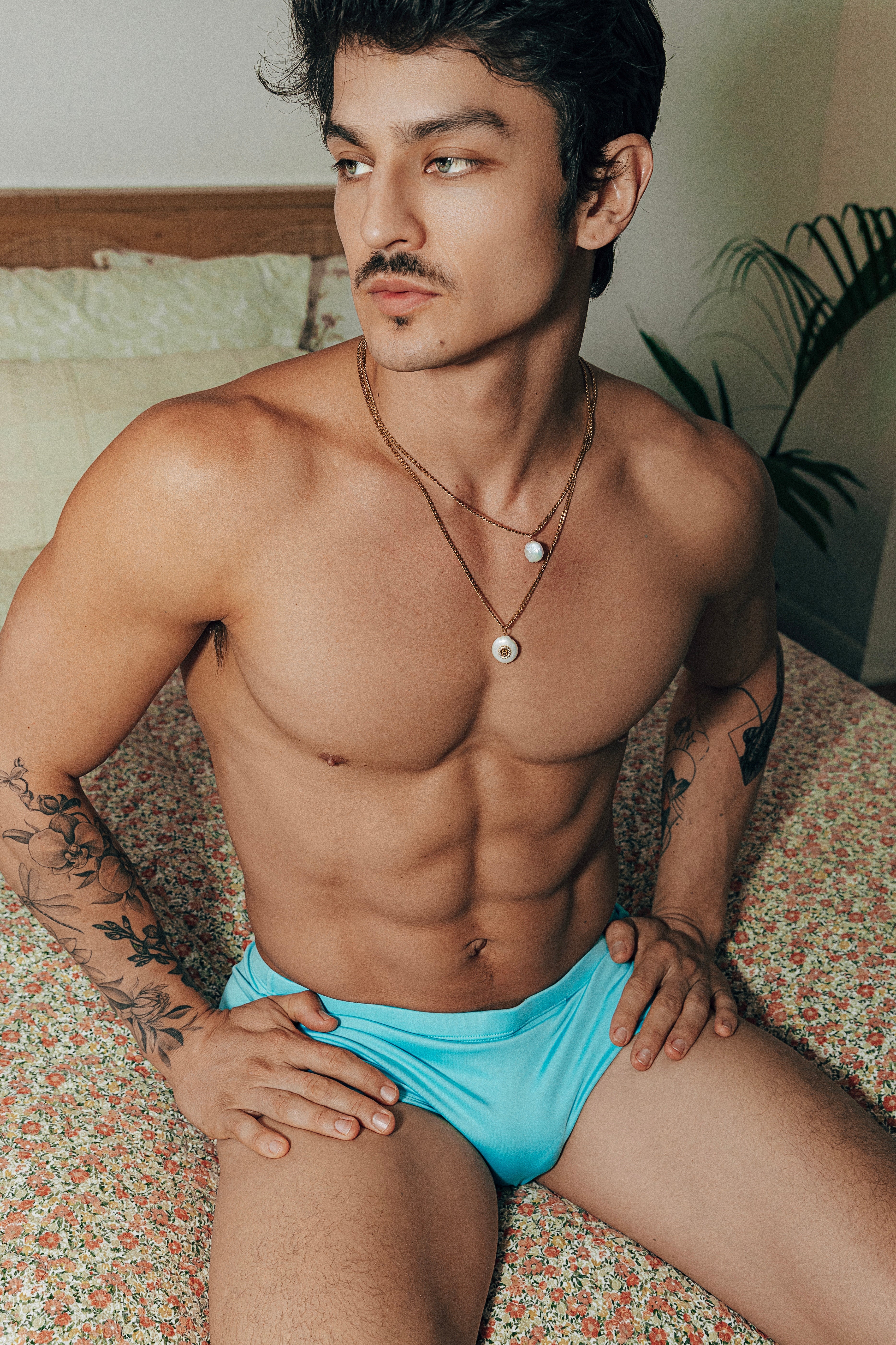 Étalon Aqua Swim Sunga - men's swim brief seated at pool, front angle