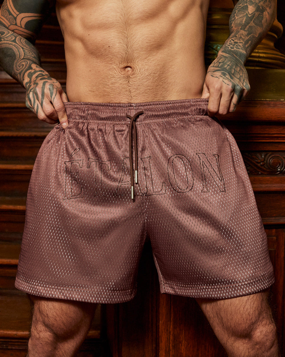 Etalon Crystal Shorts with chocolate crystal stone logo — front view men's athletic