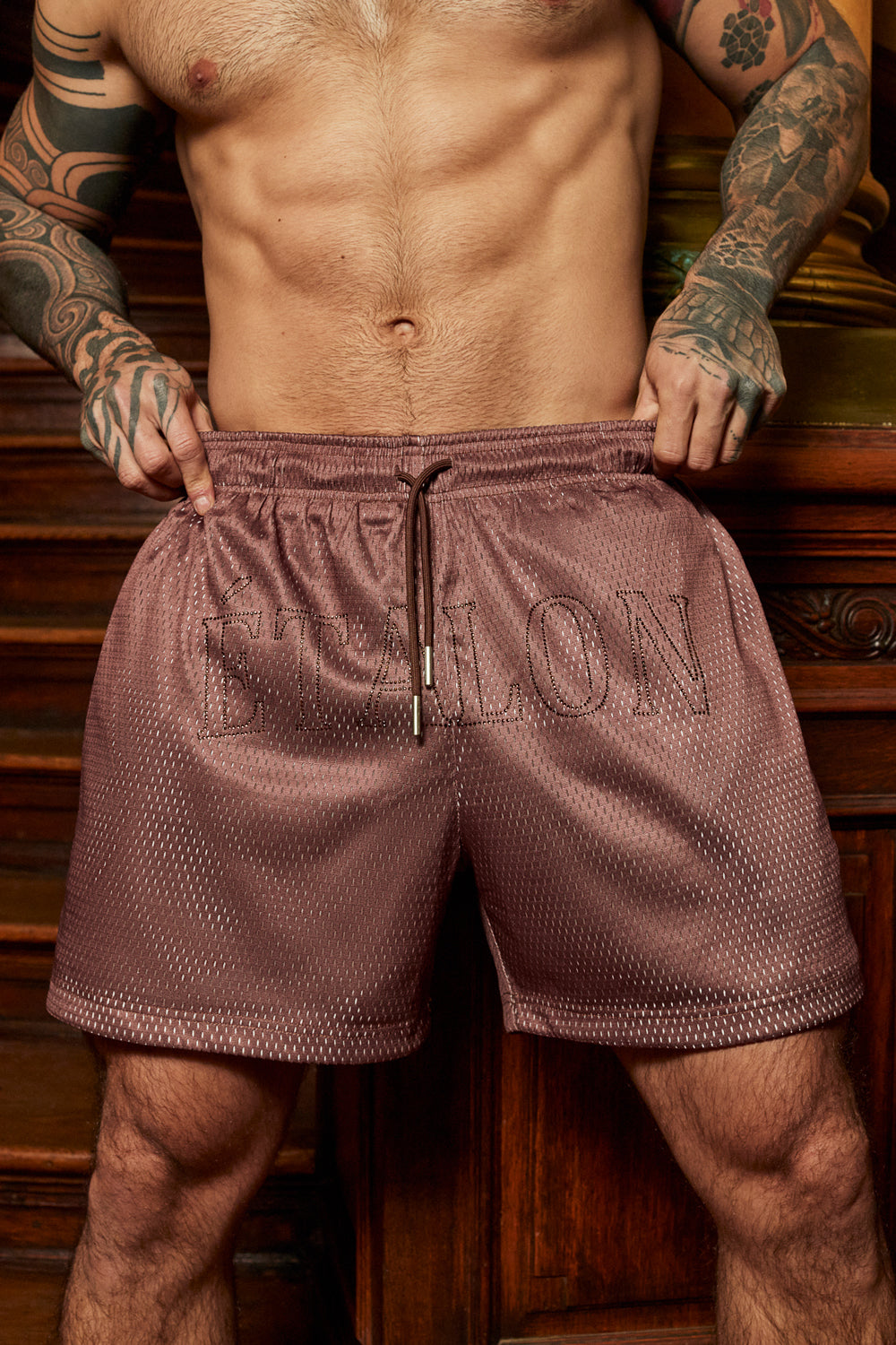 Etalon Crystal Shorts with chocolate crystal stone logo — front view men's athletic