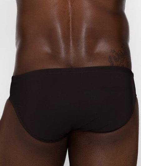 Sean & Val Classic Brief Black — men's swim brief lifestyle shot at beach or pool