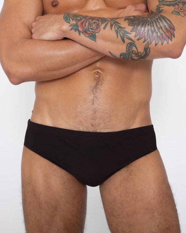 Sean & Val Classic Brief Black — men's swim brief, model front view
