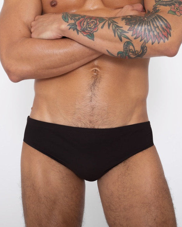 Sean & Val Classic Brief Black — men's swim brief, model front view