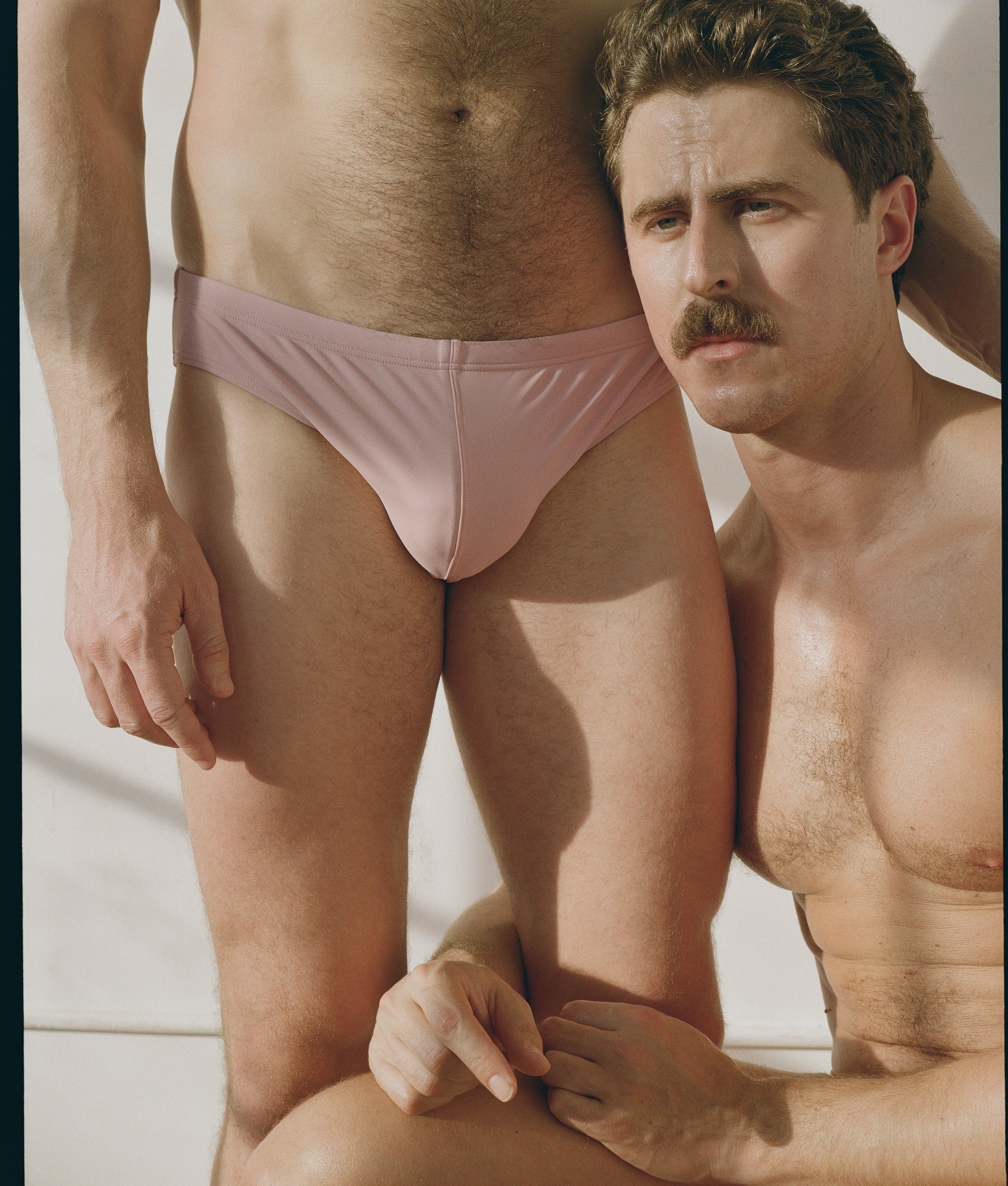 Sean & Val Racer Brief Paloma — men's swim brief worn in group lifestyle shot