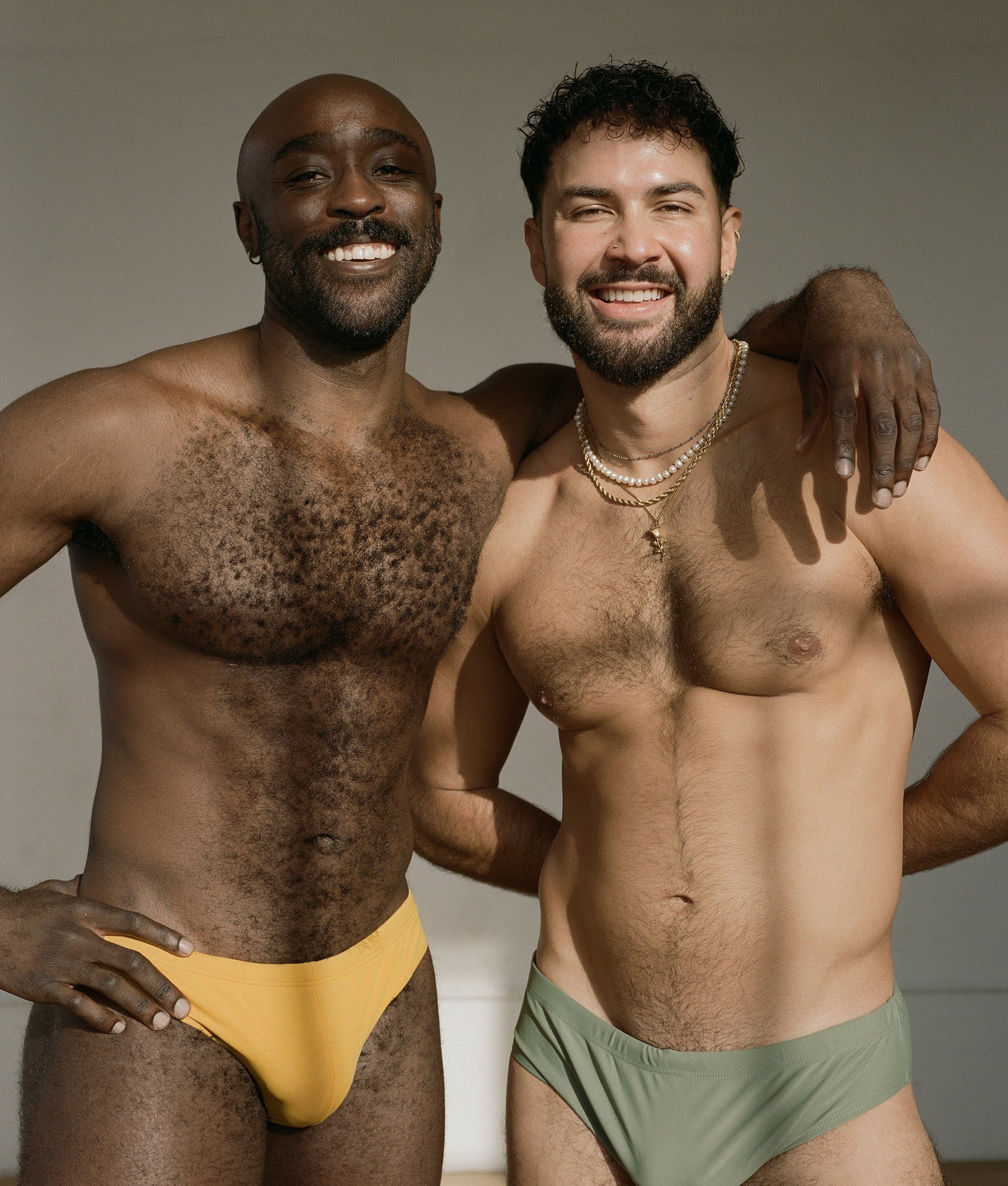 Sean & Val Racer Brief Sunflower — men's swim brief worn in group lifestyle shot