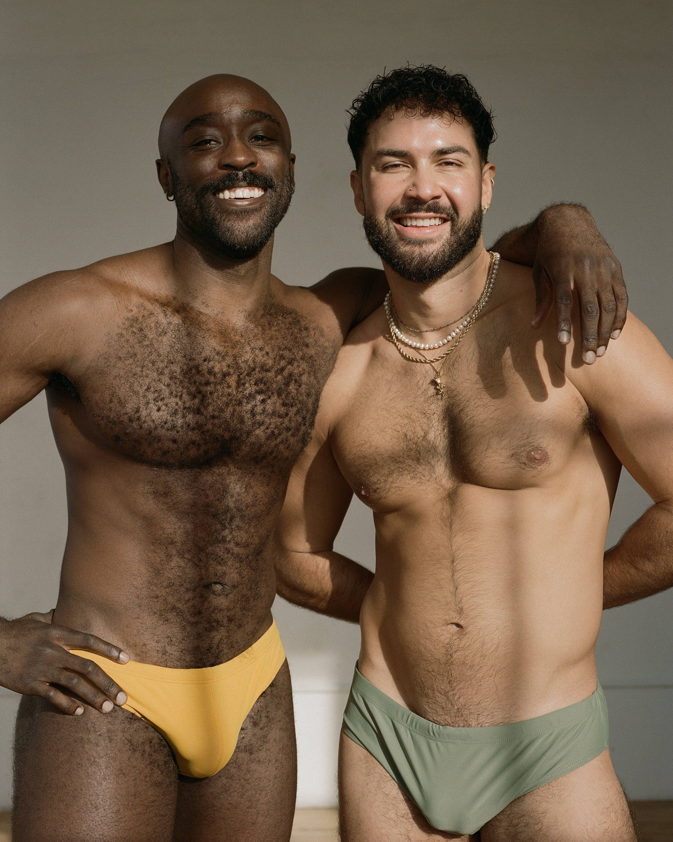 Sean & Val Racer Brief Sunflower — men's swim brief worn in group lifestyle shot