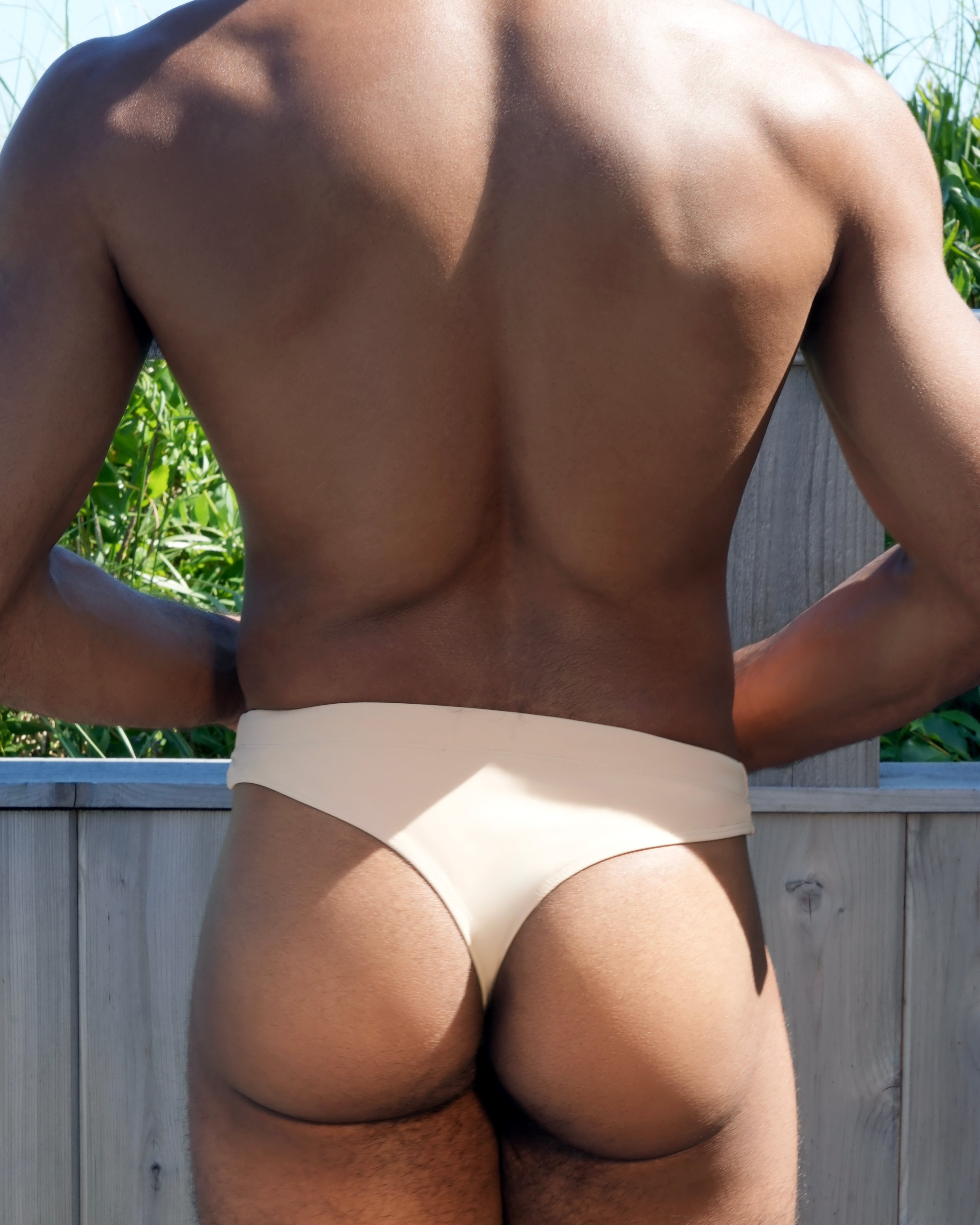 Helio Poseidon Swim Thong Sandstone - men's minimal swim thong back view, back view