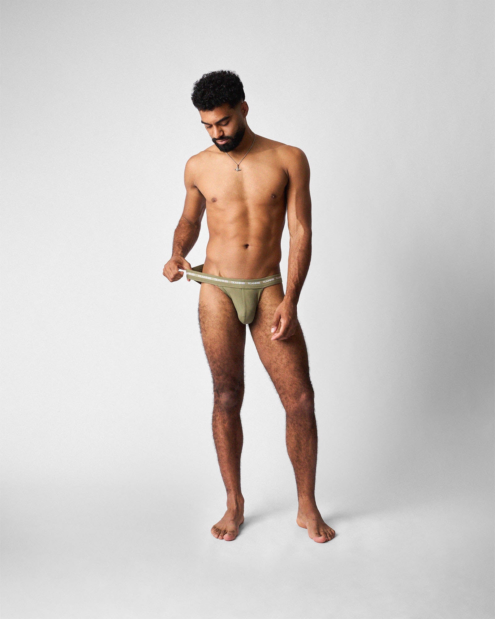Teamm8 Ultra Sports Swim Brief Army - men's cut-out swim brief detail, close-up