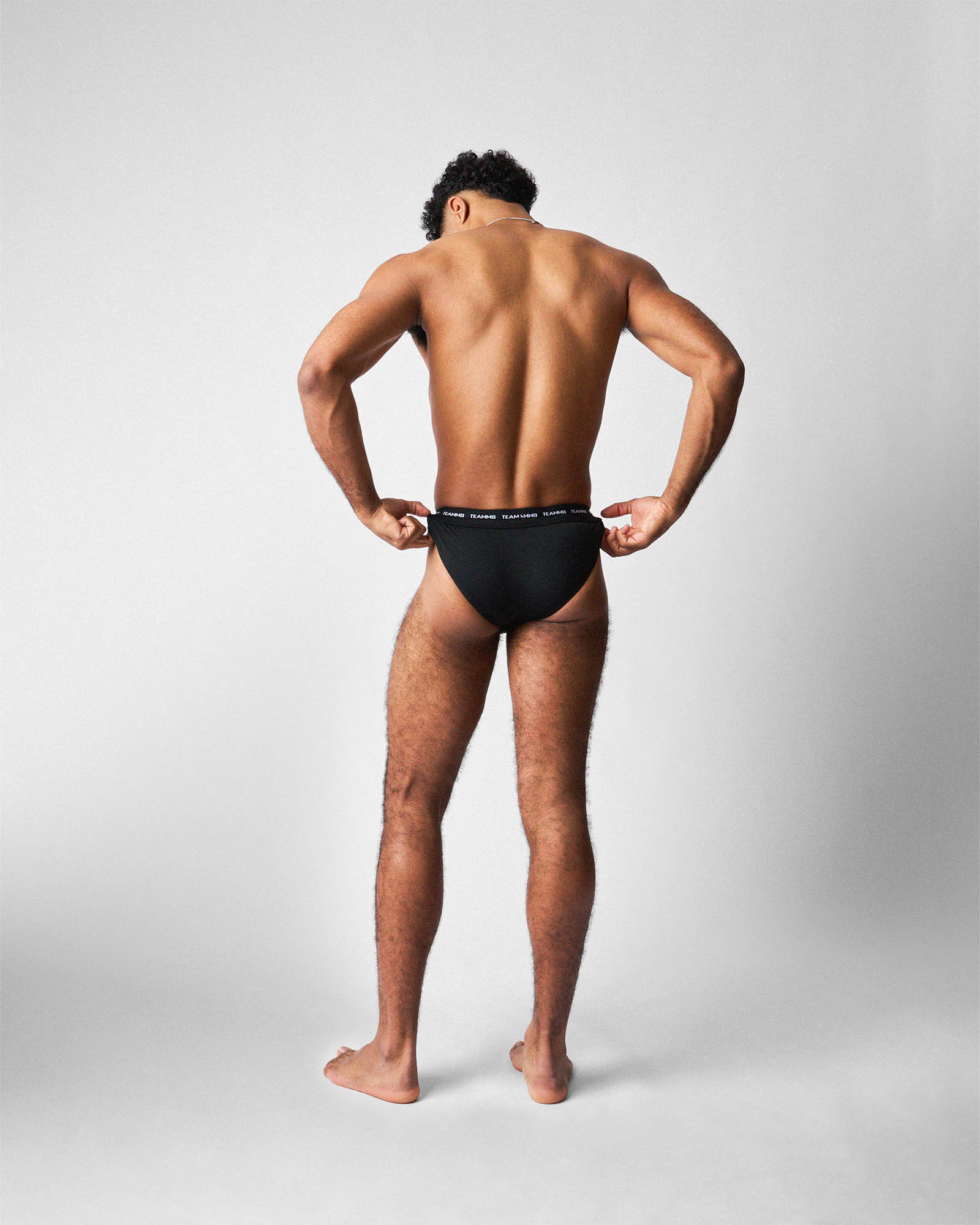 Teamm8 Ultra Sports Swim Brief Jet - men's swim brief cut-out detail, close-up