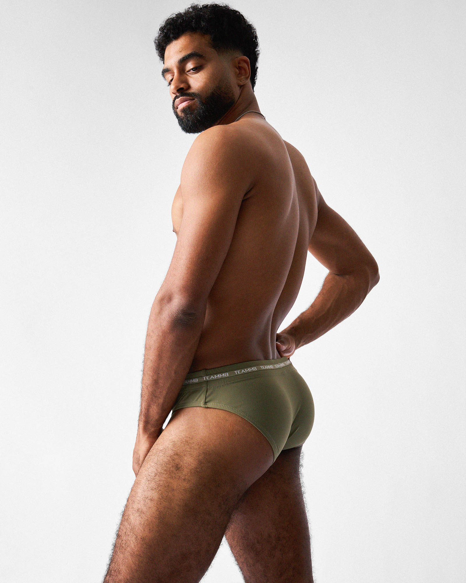 Teamm8 Ultra Swim Brief Army - men's army swim brief at beach, lifestyle
