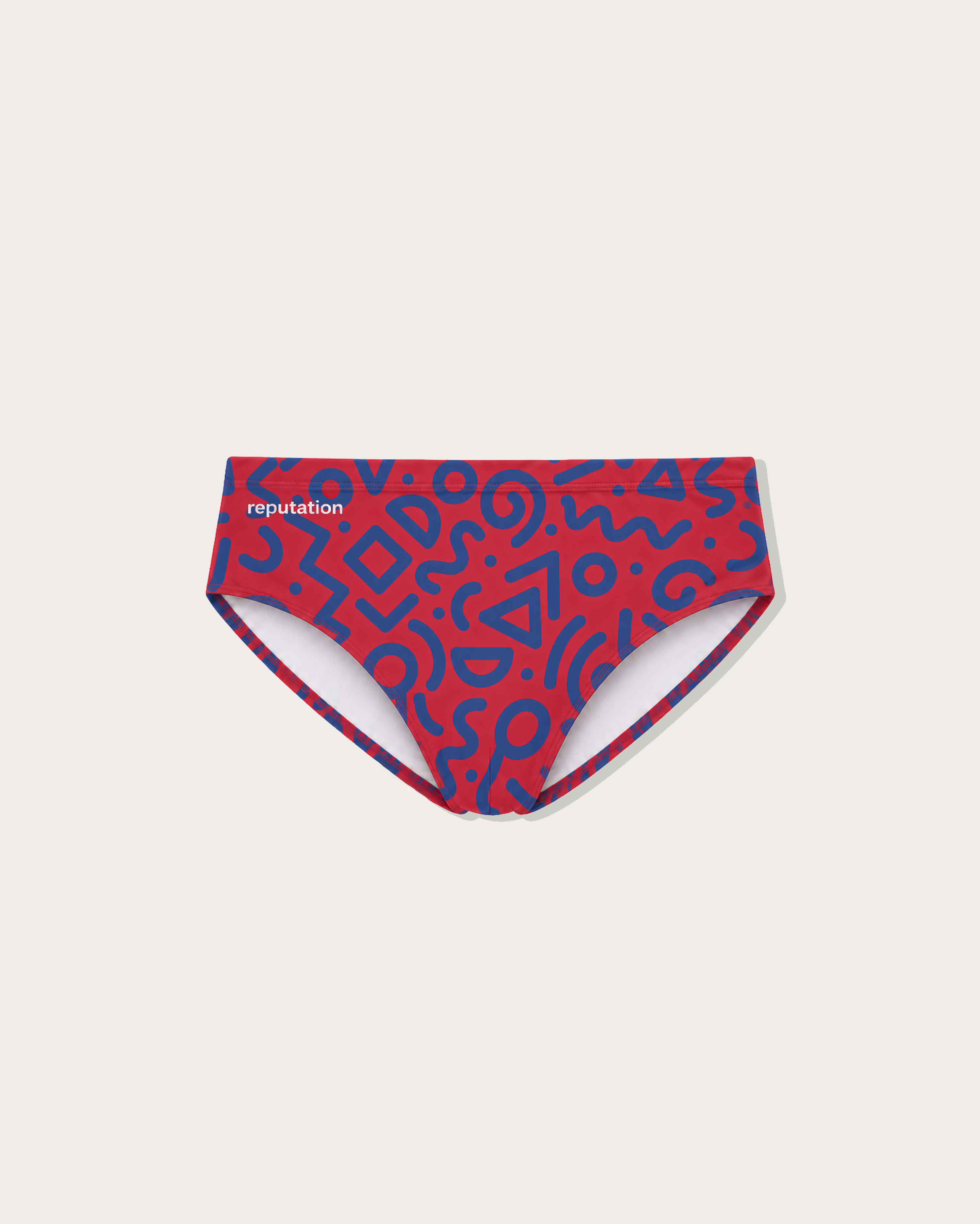 Reputation Sunga 02 Red Blue Glyph — men's ultra-matte sunga brief flatlay