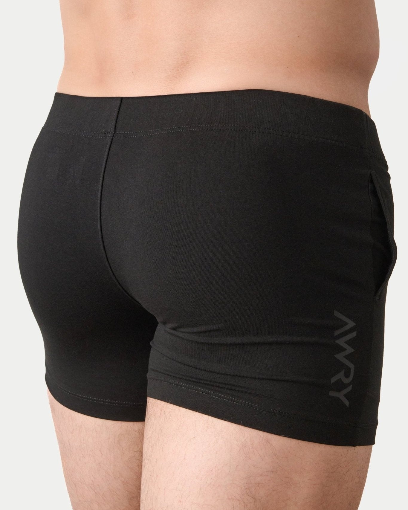 Awry Flow 4 Inch Short V2 Black — side view showing roomy front pocket and smooth waistband