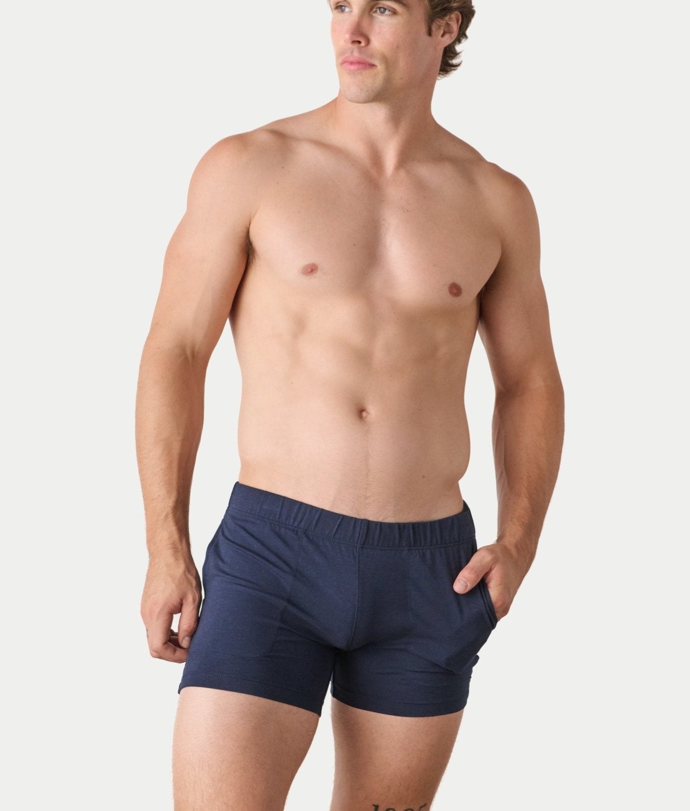 Awry Flow 4 Inch Short V2 Navy — close-up of bamboo-cotton fabric texture and form-fitting leg opening