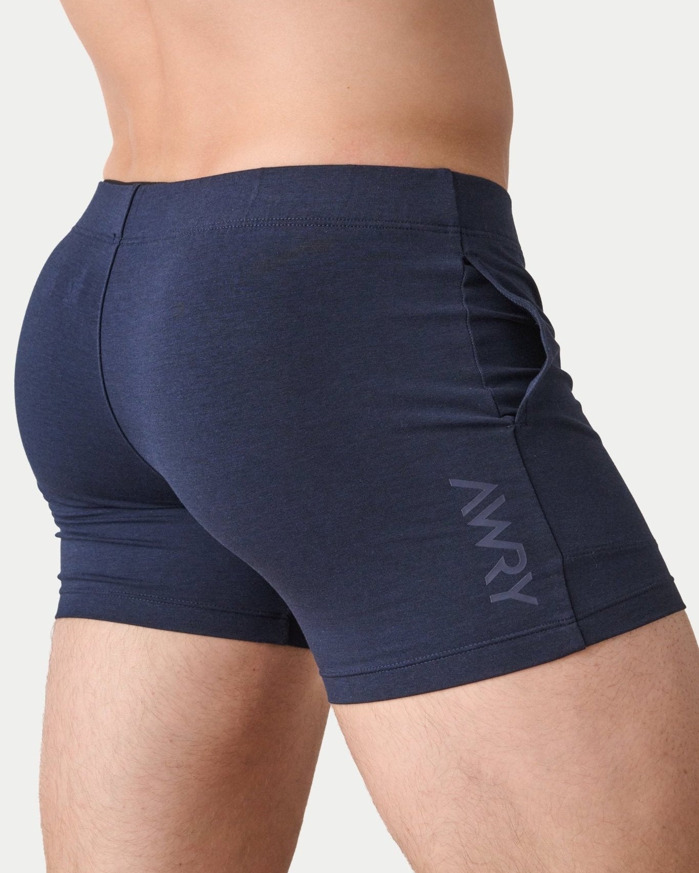 Awry Flow 4 Inch Short V2 Navy — side view showing roomy front pocket and smooth waistband