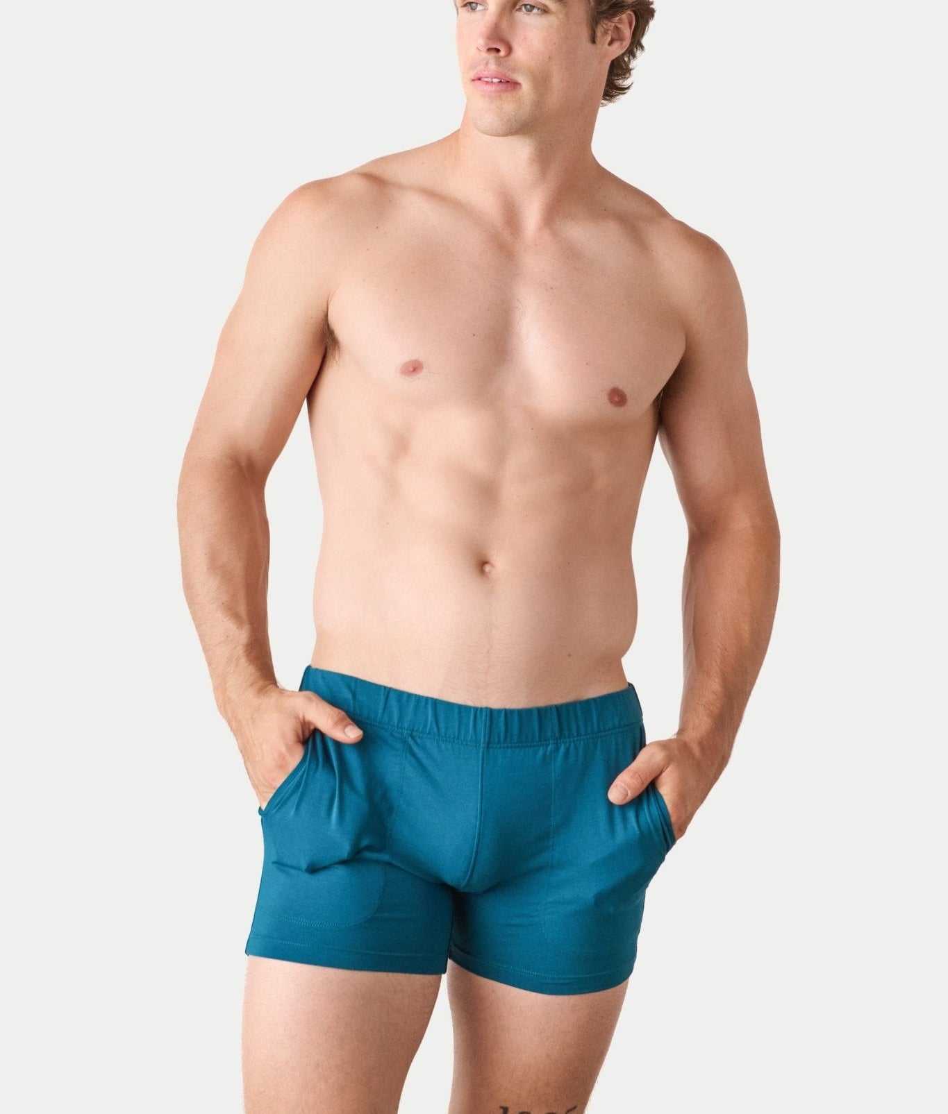 Awry Flow 4 Inch Short V2 Teal — close-up of bamboo-cotton fabric texture and form-fitting leg opening