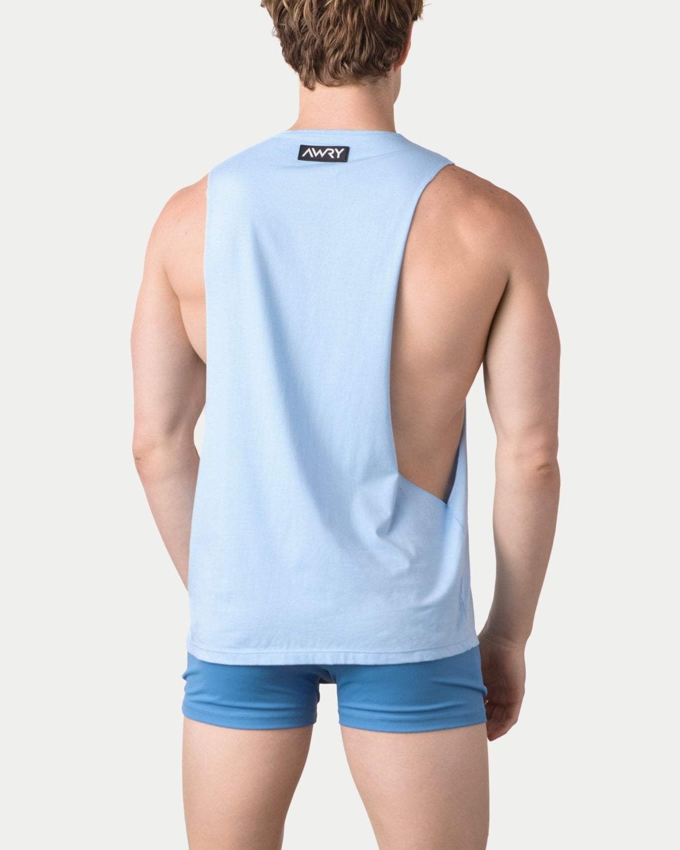 Awry Impact Tank Frost — side view showing deep armhole cutout and relaxed draped silhouette