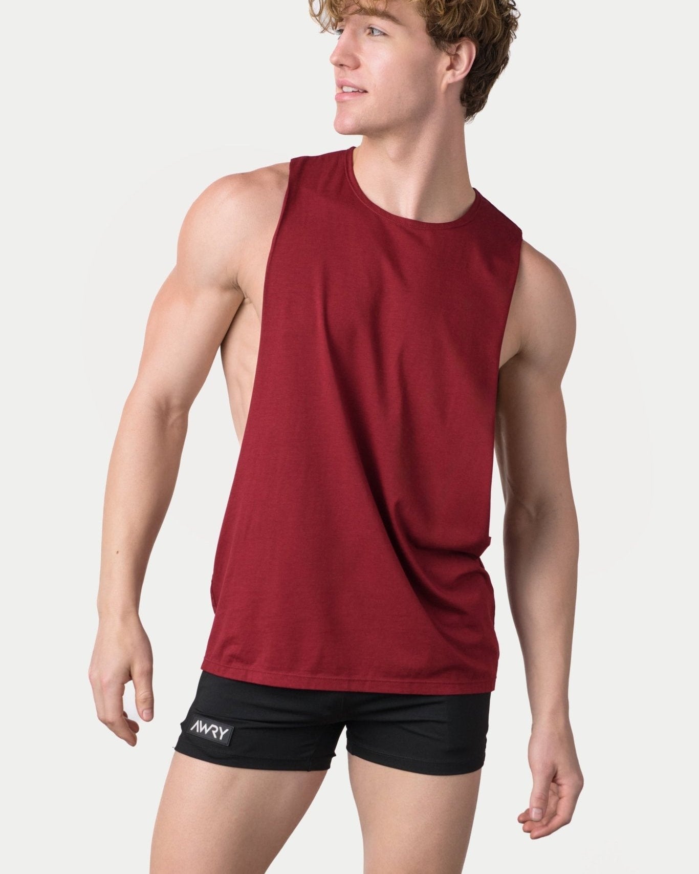 Awry Impact Tank Maroon — men's cotton-modal activewear tank with deep side cutouts, front view