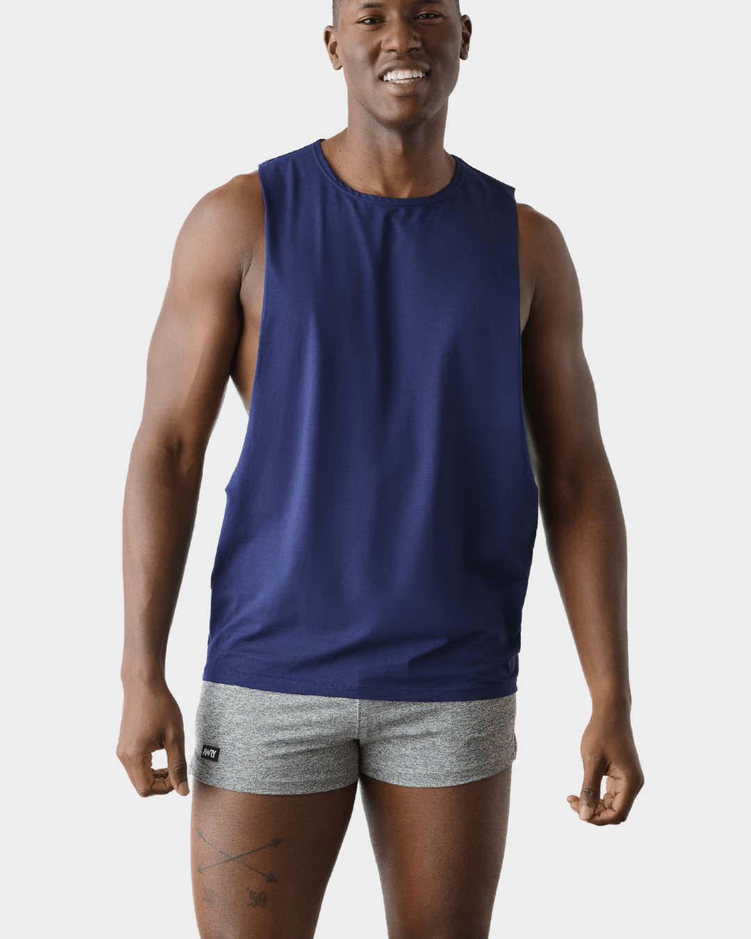 Awry Impact Tank Navy — men's cotton-modal activewear tank with deep side cutouts, front view