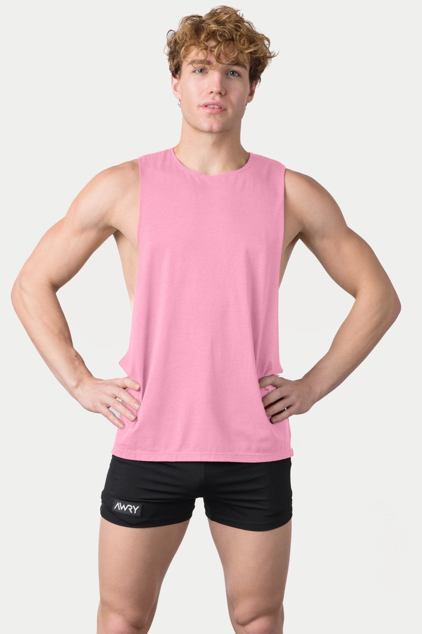 Awry Impact Tank Pink — men's cotton-modal activewear tank with deep side cutouts, front view