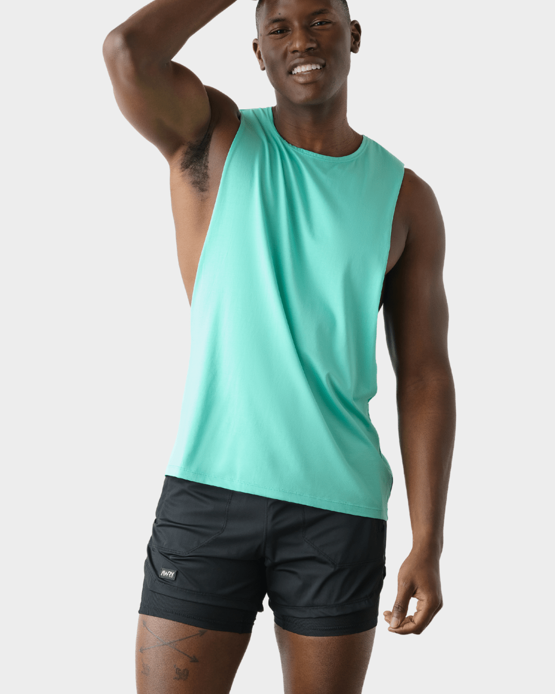 Awry Impact Tank Turquoise — rear view showing open back and ventilation design