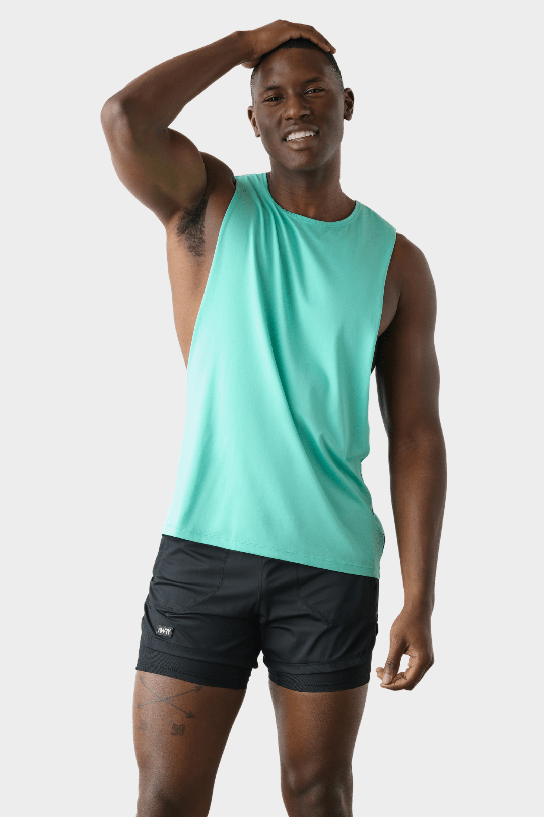 Awry Impact Tank Turquoise — rear view showing open back and ventilation design