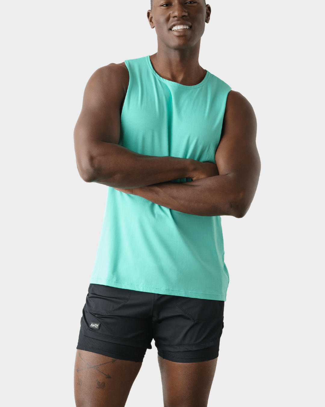 Awry Impact Tank Turquoise — close-up of organic cotton-modal fabric texture and drape