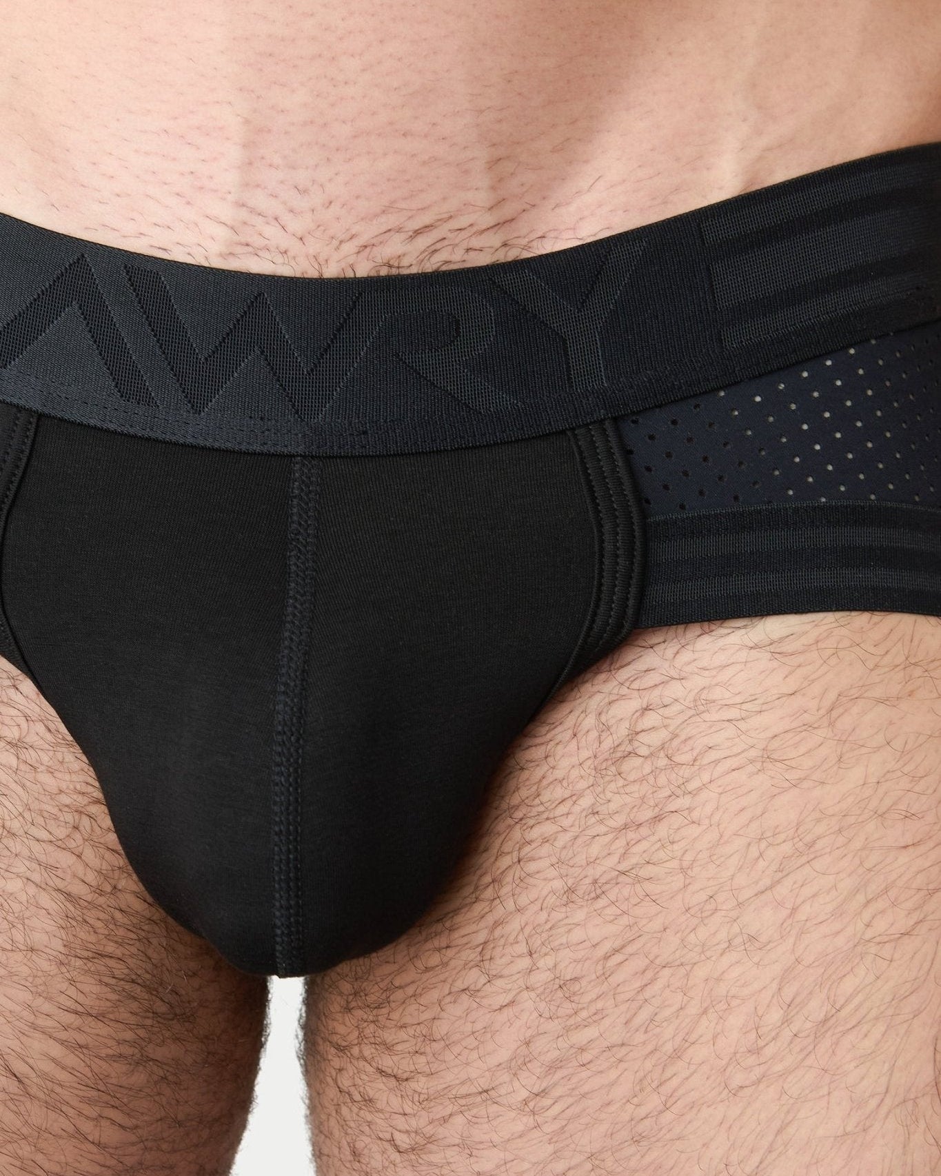 Awry Lift Brief Black — side profile showing 2-ply front pouch and low-rise brief cut