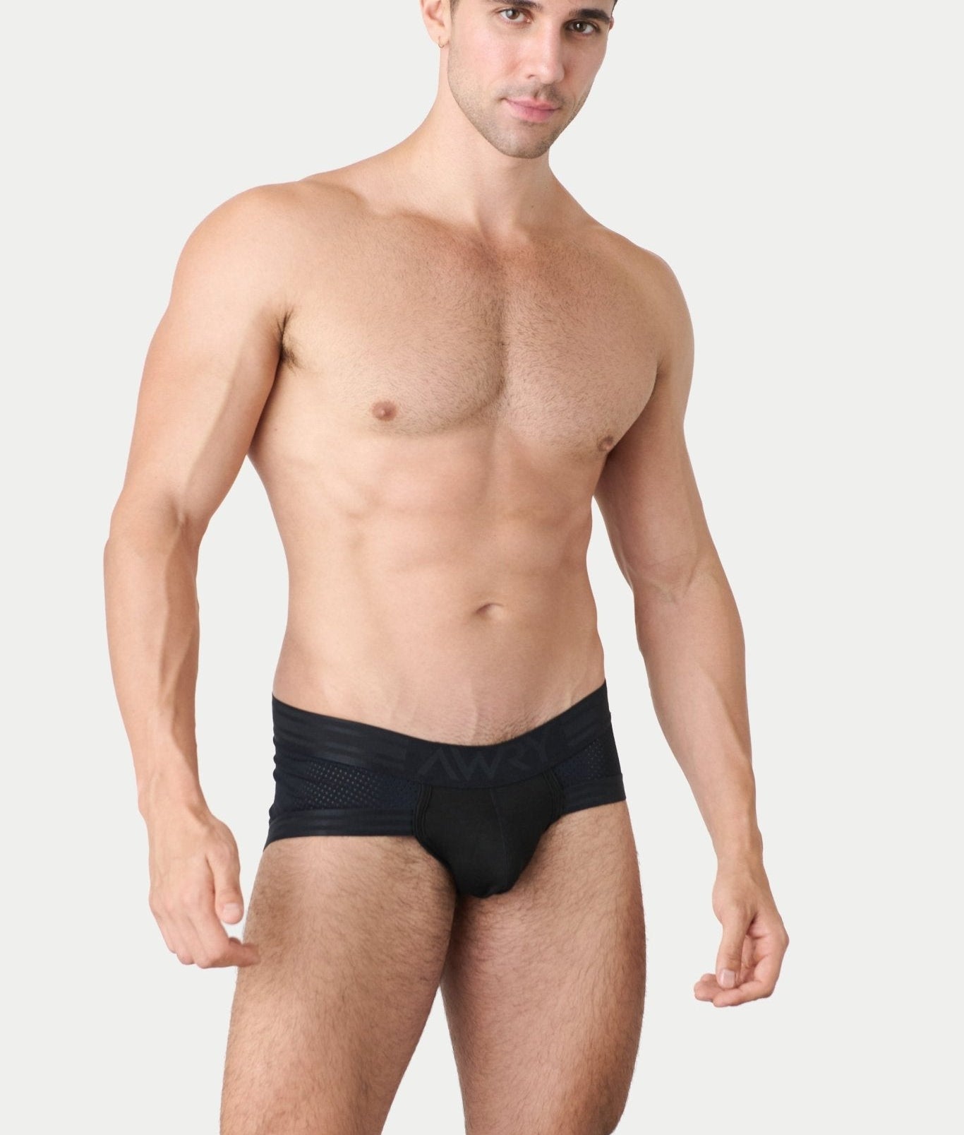 Awry Lift Brief Black — detail shot of branded waistband and 4-way stretch mesh fabric