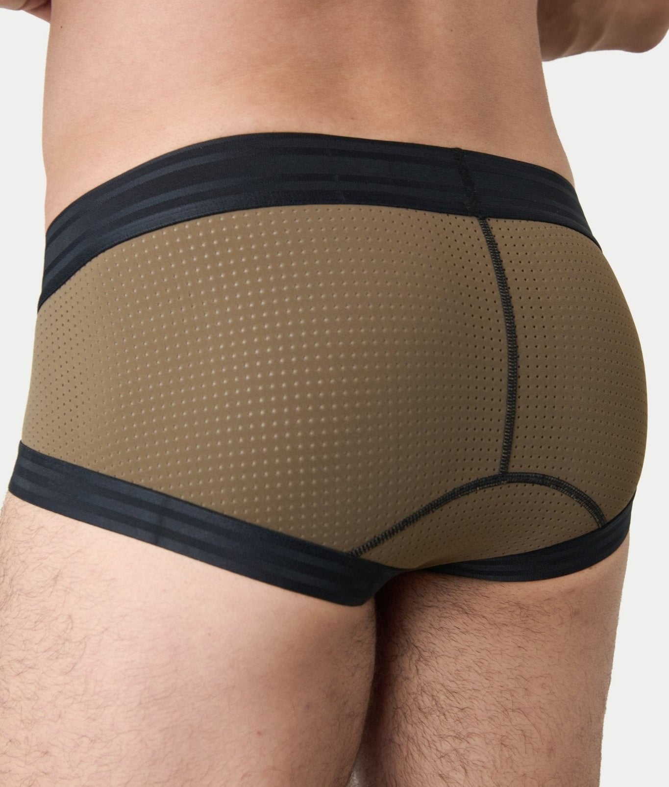 Awry Lift Brief Moss Black - side view showing low-rise silhouette and mesh panels