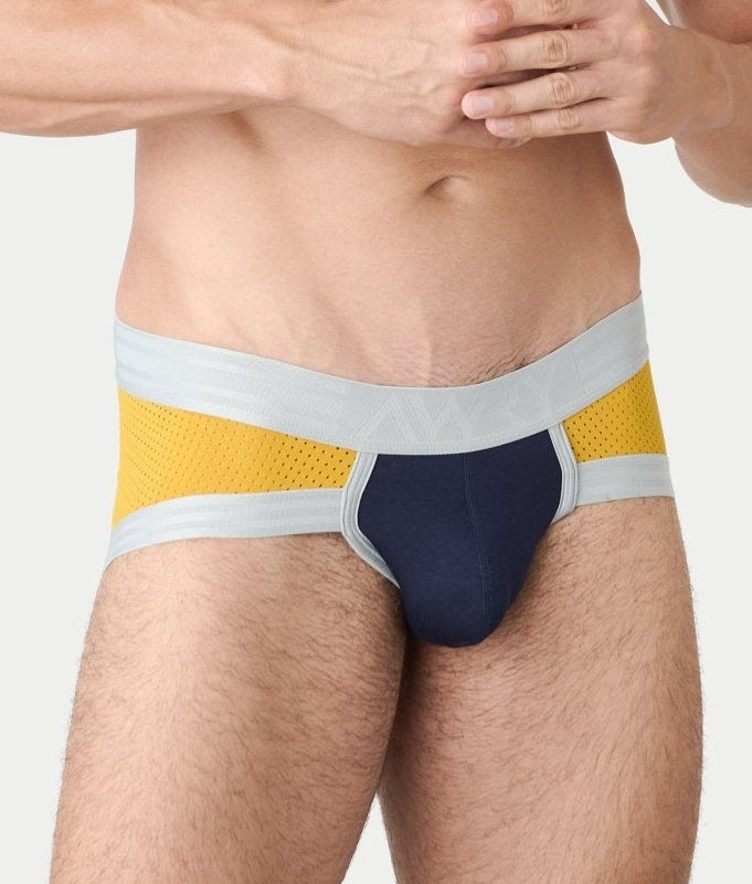 Awry Lift Brief Navy Gold — men's performance activewear brief with built-in jockstrap, front view