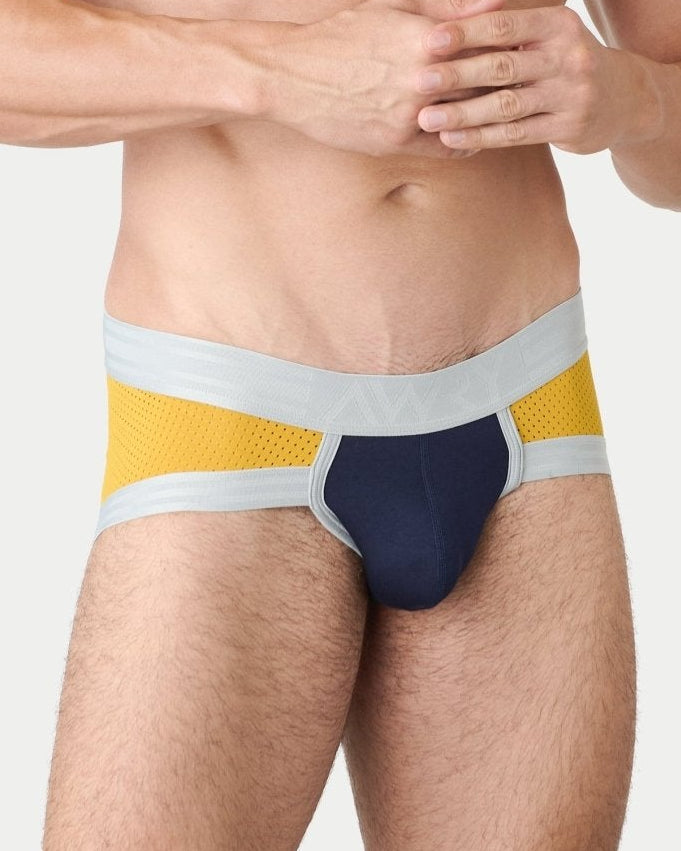 Awry Lift Brief Navy Gold — men's performance activewear brief with built-in jockstrap, front view