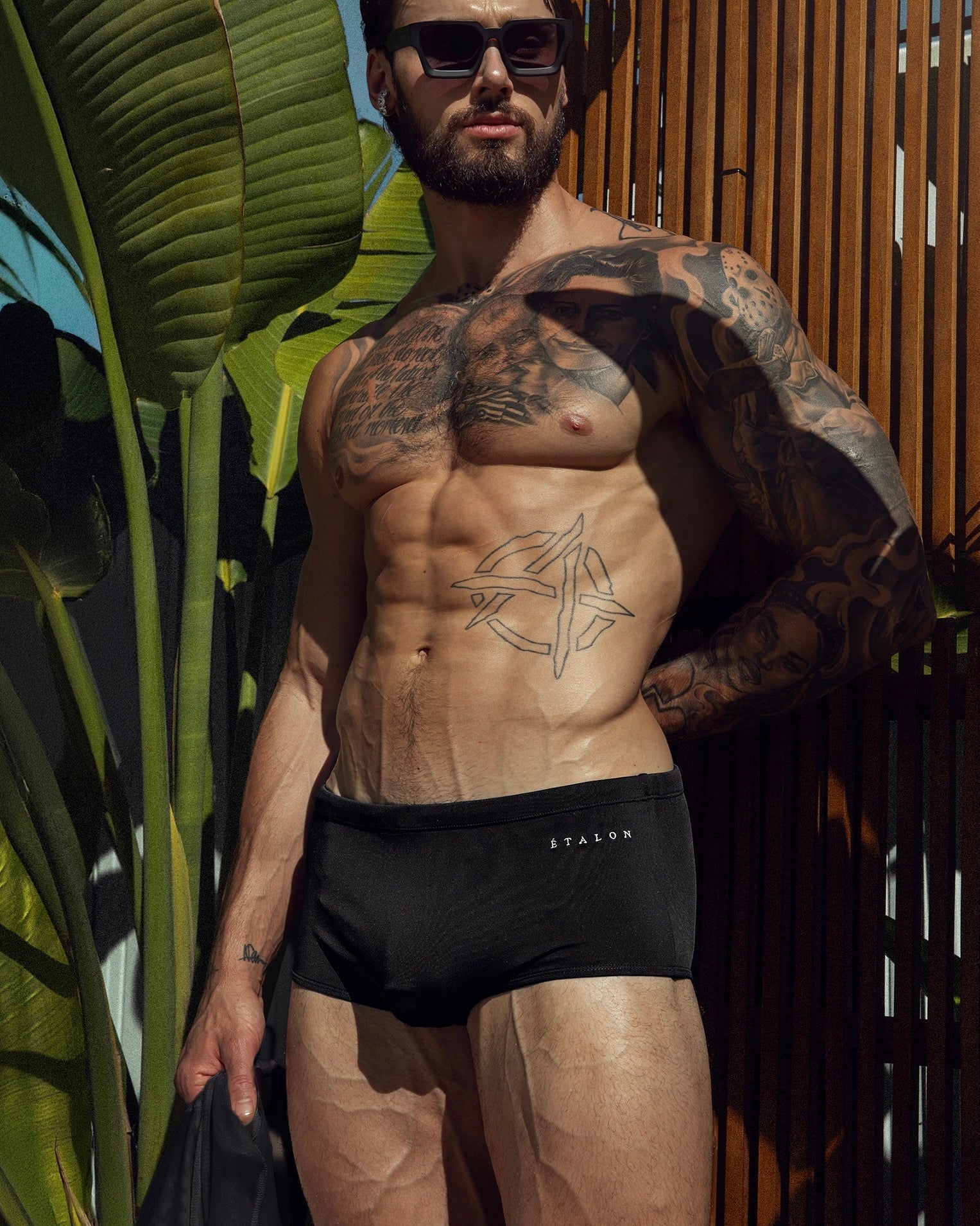 Étalon Black Swim Sunga - men's swim brief worn poolside, full body front