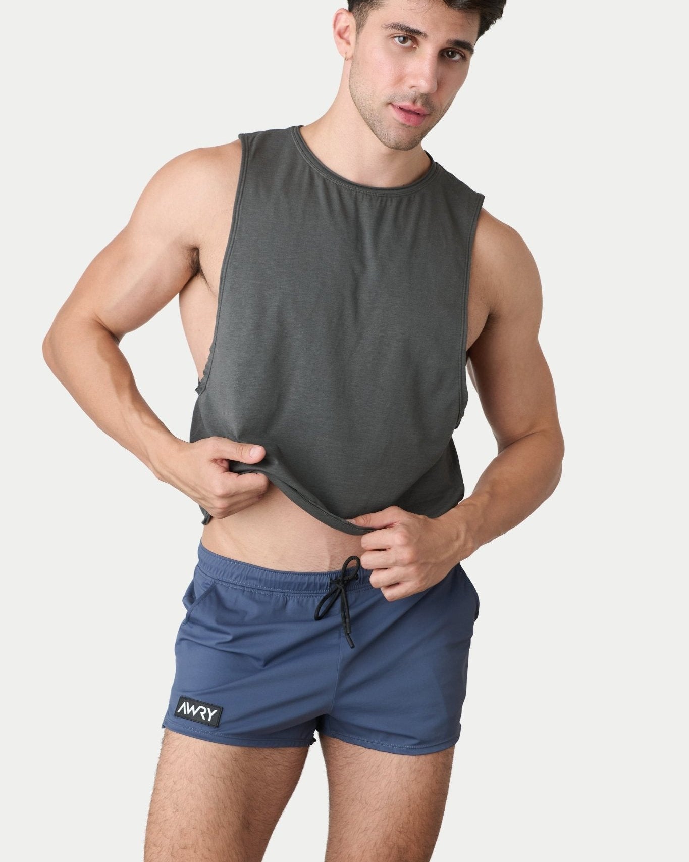 Awry Raw Crop Tank Charcoal — side view showing cropped midriff-exposing silhouette