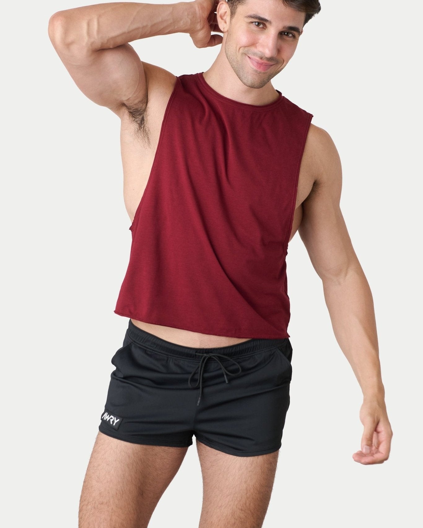 Awry Raw Crop Tank Maroon — side view showing cropped midriff-exposing silhouette