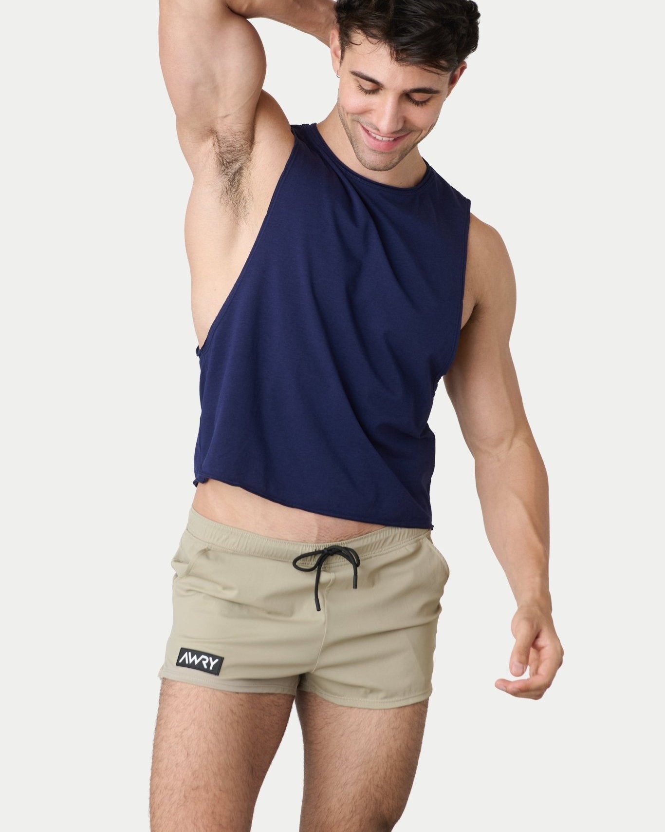 Awry Raw Crop Tank Navy — side view showing cropped midriff-exposing silhouette