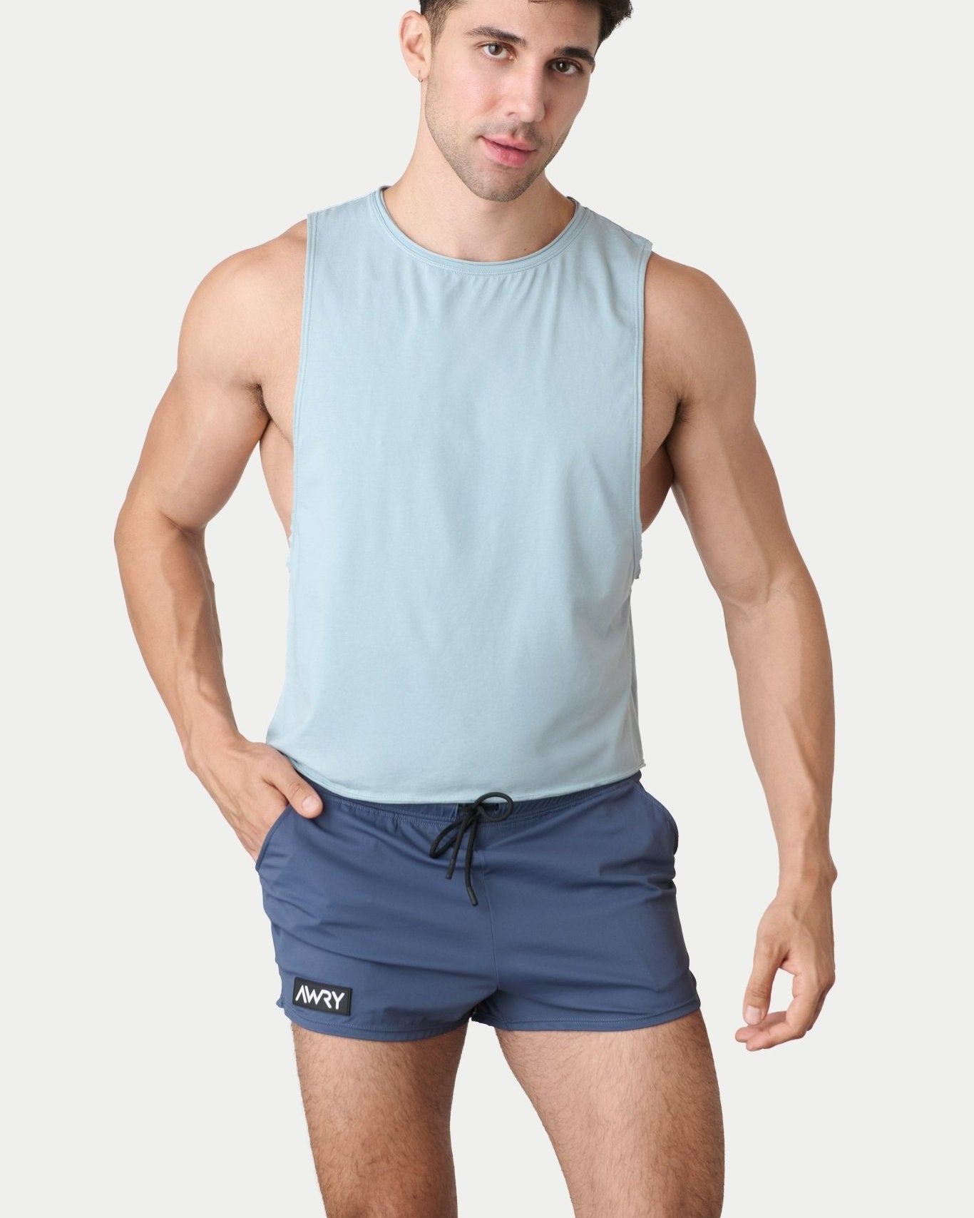 Awry Raw Crop Tank Soft Blue — men's cotton-modal activewear crop tank with raw edges, front view