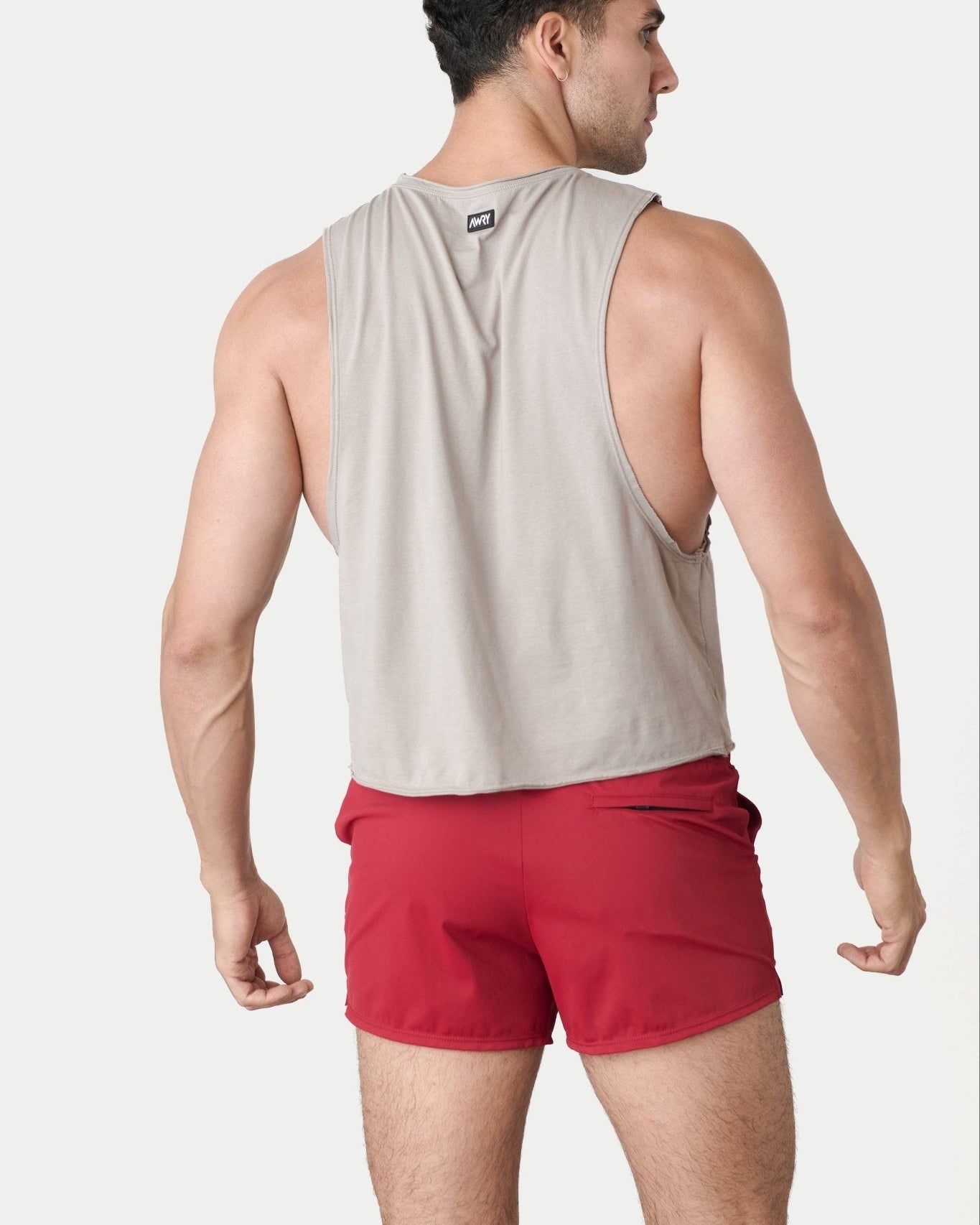 Awry Raw Crop Tank Taupe — close-up of raw unfinished edge at collar and armhole